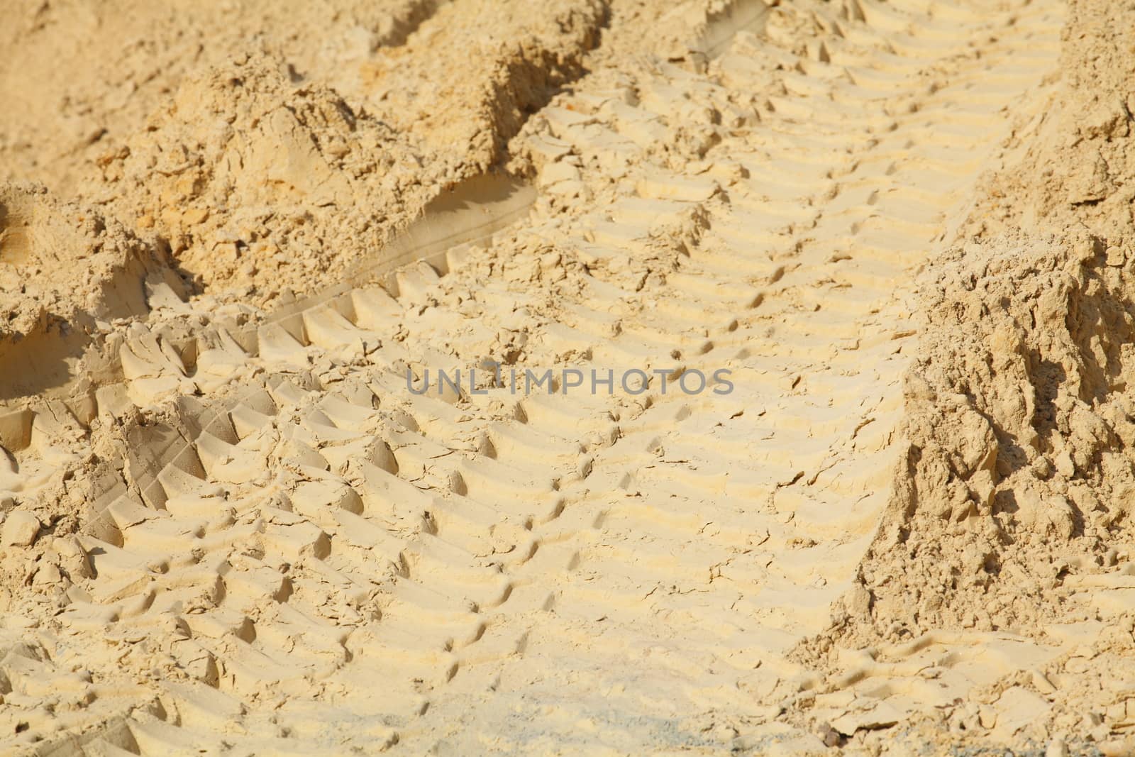 Exclavator Tracks in the  Sand