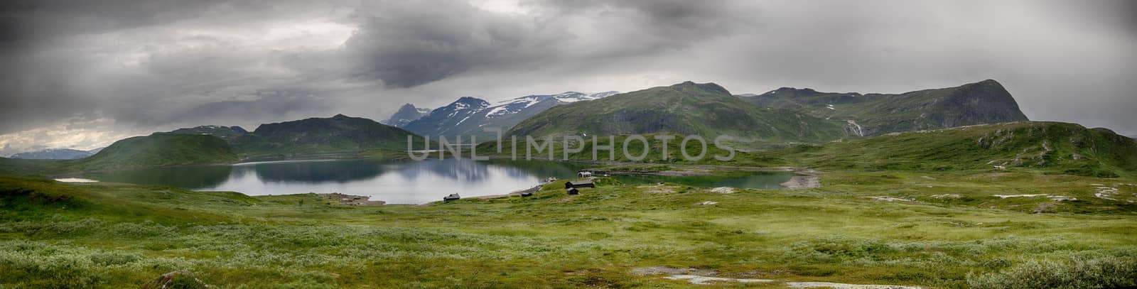 Beautiful mountain landscape panorama with lake and clouds by javax