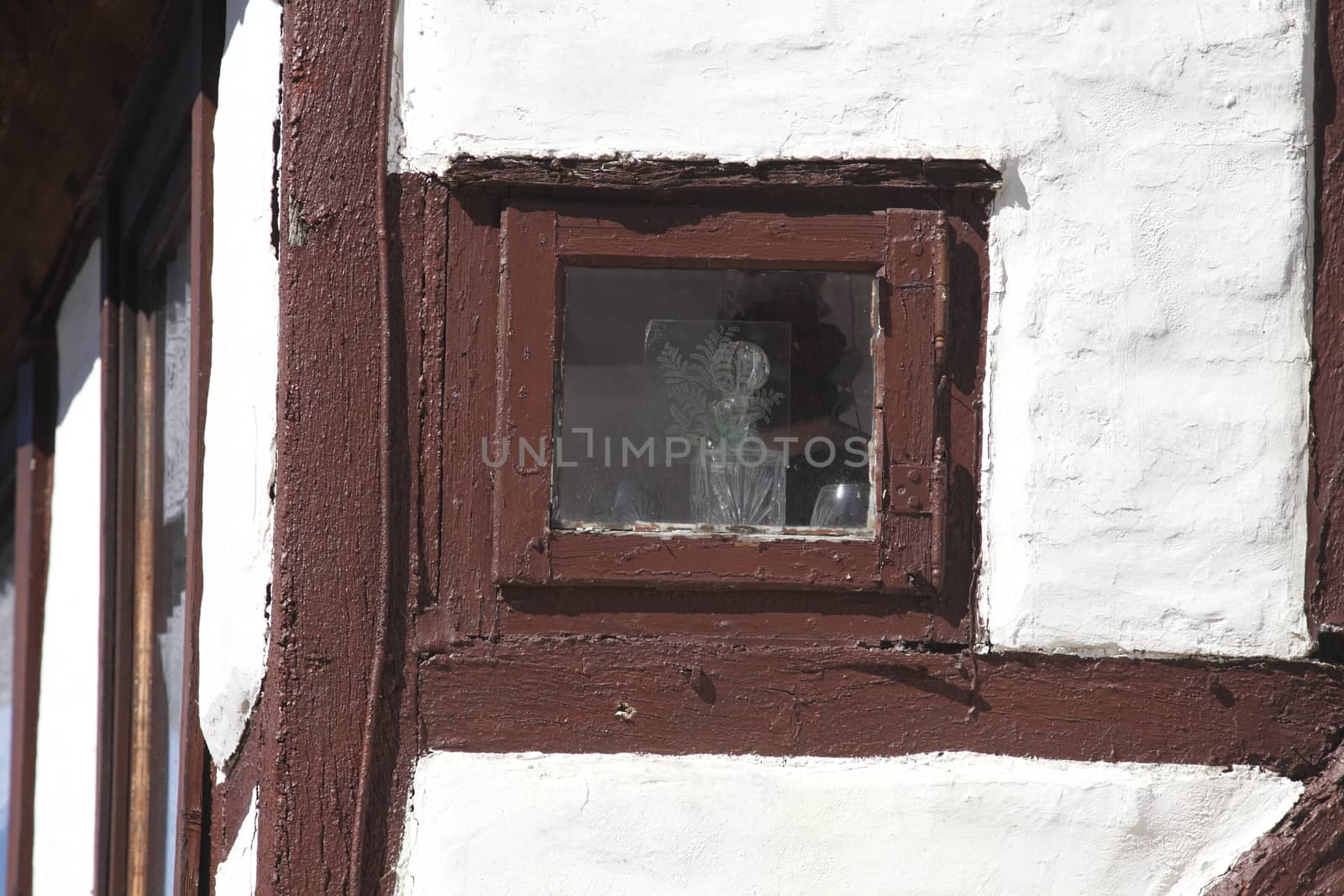 window on a half-timbered house wall