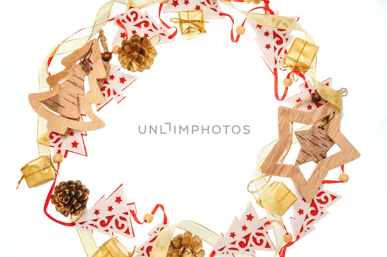frame made of wooden Christmas toys on a white background and text.