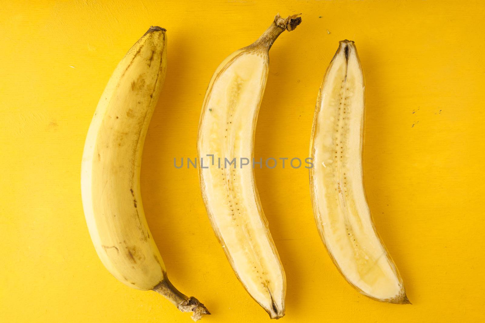 Bananas on a yellow background horizontal
