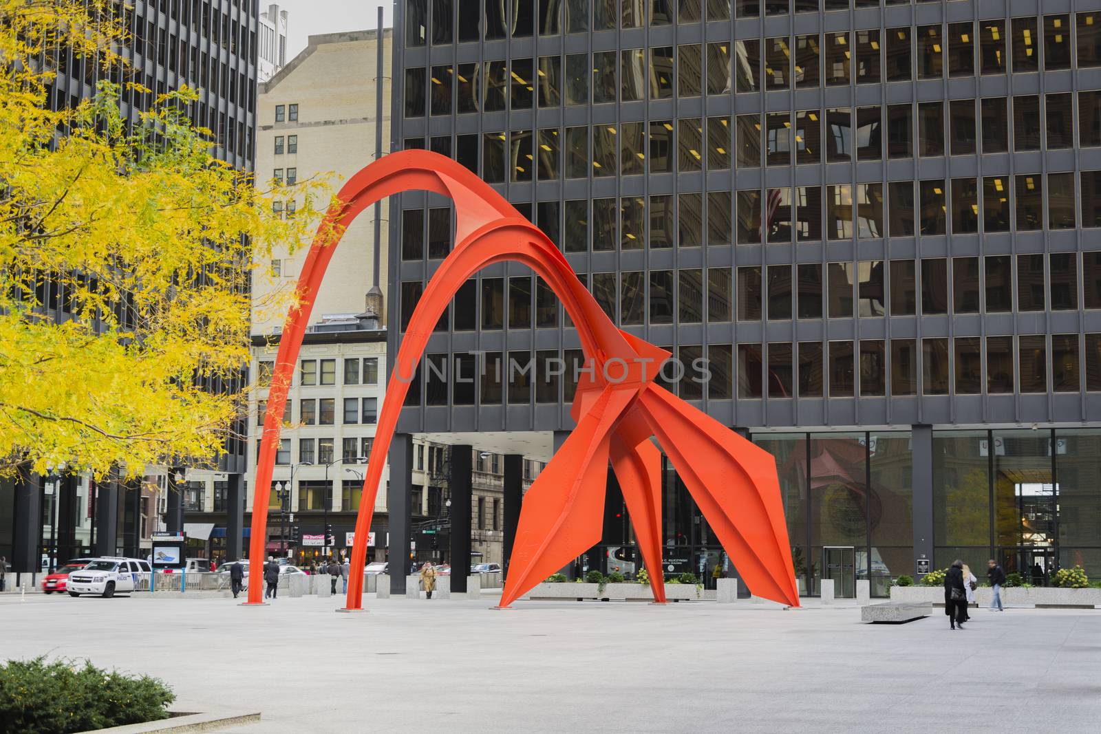 Chicago, IL, USA, october 27, 2016: Red Flamingo sculpture, created by artist Alexander Calder in 1973, located in the Federal Plaza in Chicago, Illinois, US