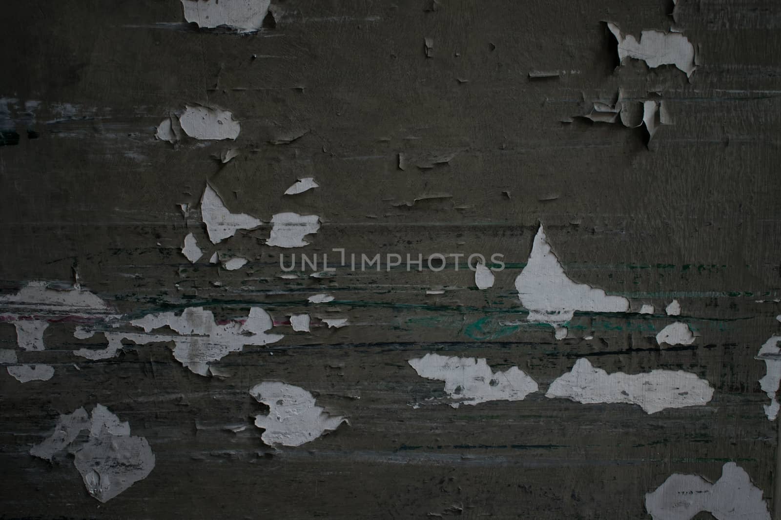 A ruined grey wall with cracks grunge style