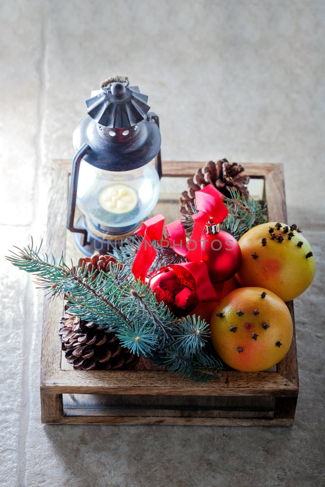 Christmas symbols as grapefruits in wooden box
