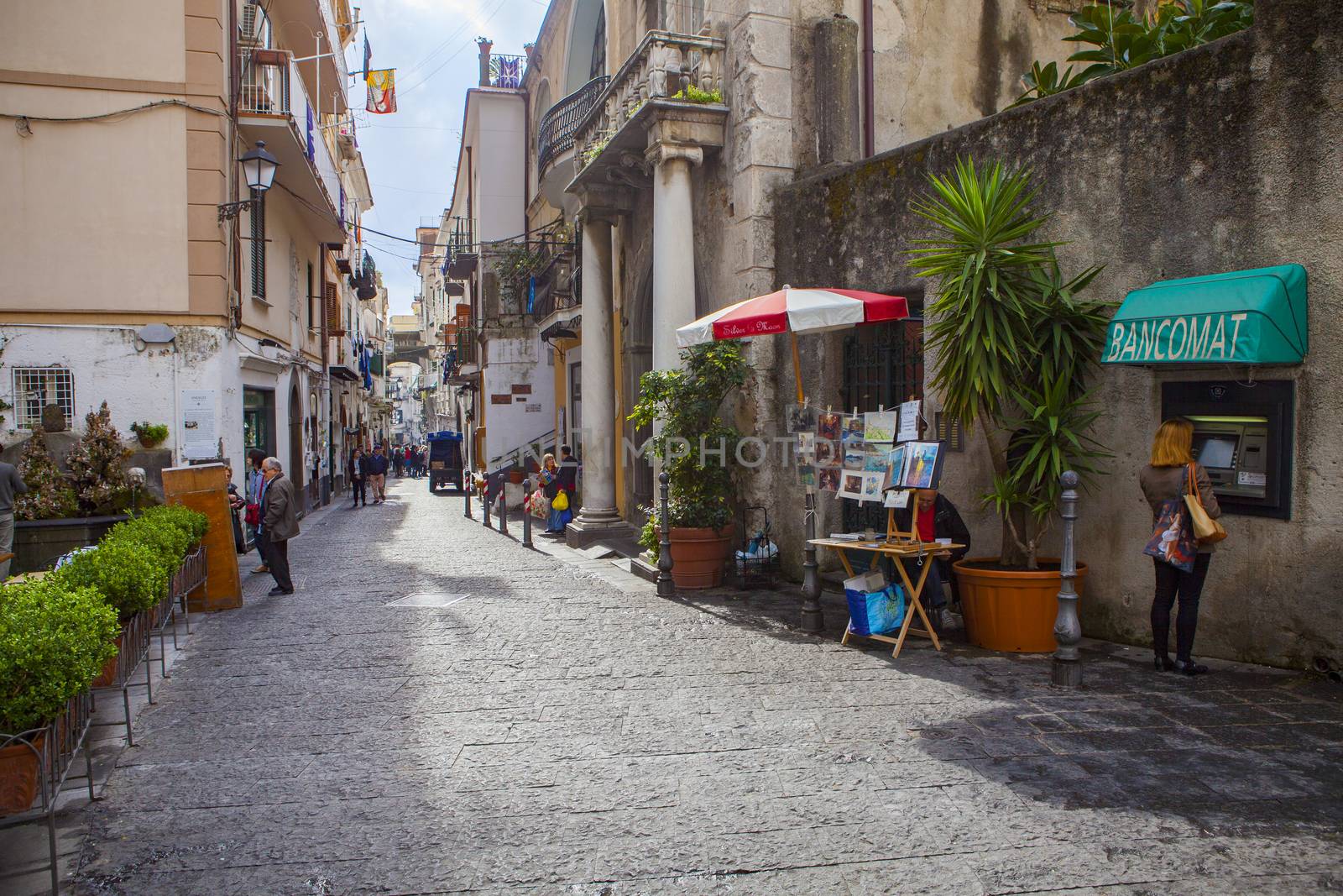 AMALFI ITALY - NOVEMBER 5 :  tourist walking in narrow treet of  by khunaspix