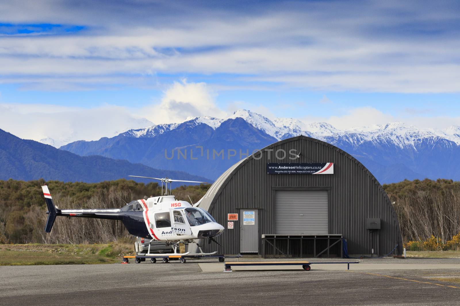 HOKITIKA NEWE ZEALAND-SEPTEMBER 3 :  anderson helicopter parking in hokitika airport important town of west coast on september 3 , 2015 in hokitika  New Zealand
