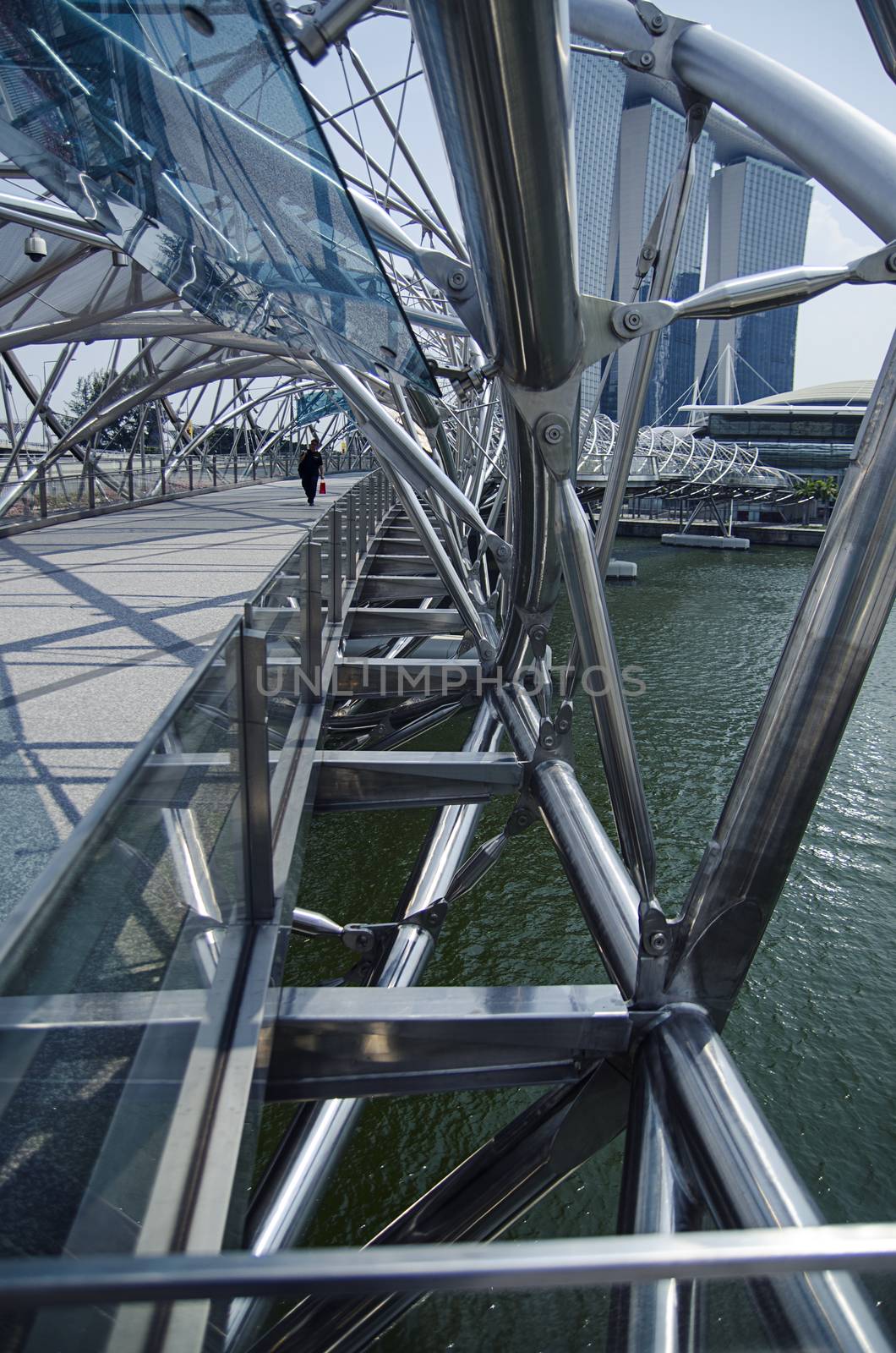 Glass ceiling footbridge with metal structures by Vanzyst