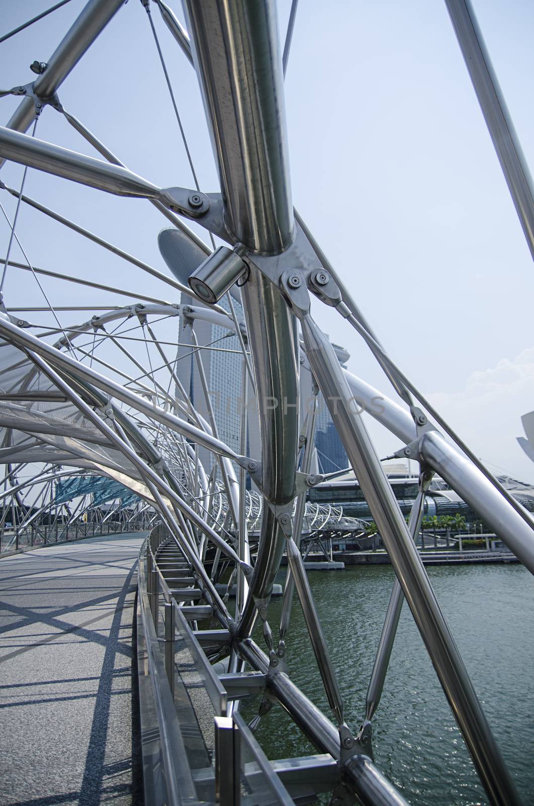 Glass ceiling footbridge with metal structures by Vanzyst