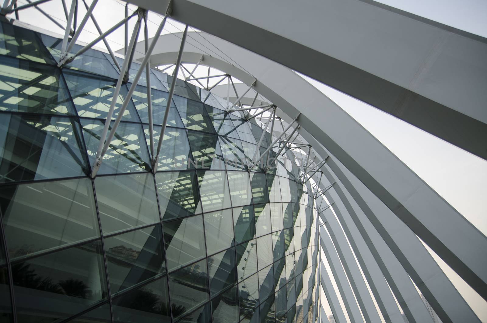 Glass ceiling footbridge with metal structures by Vanzyst