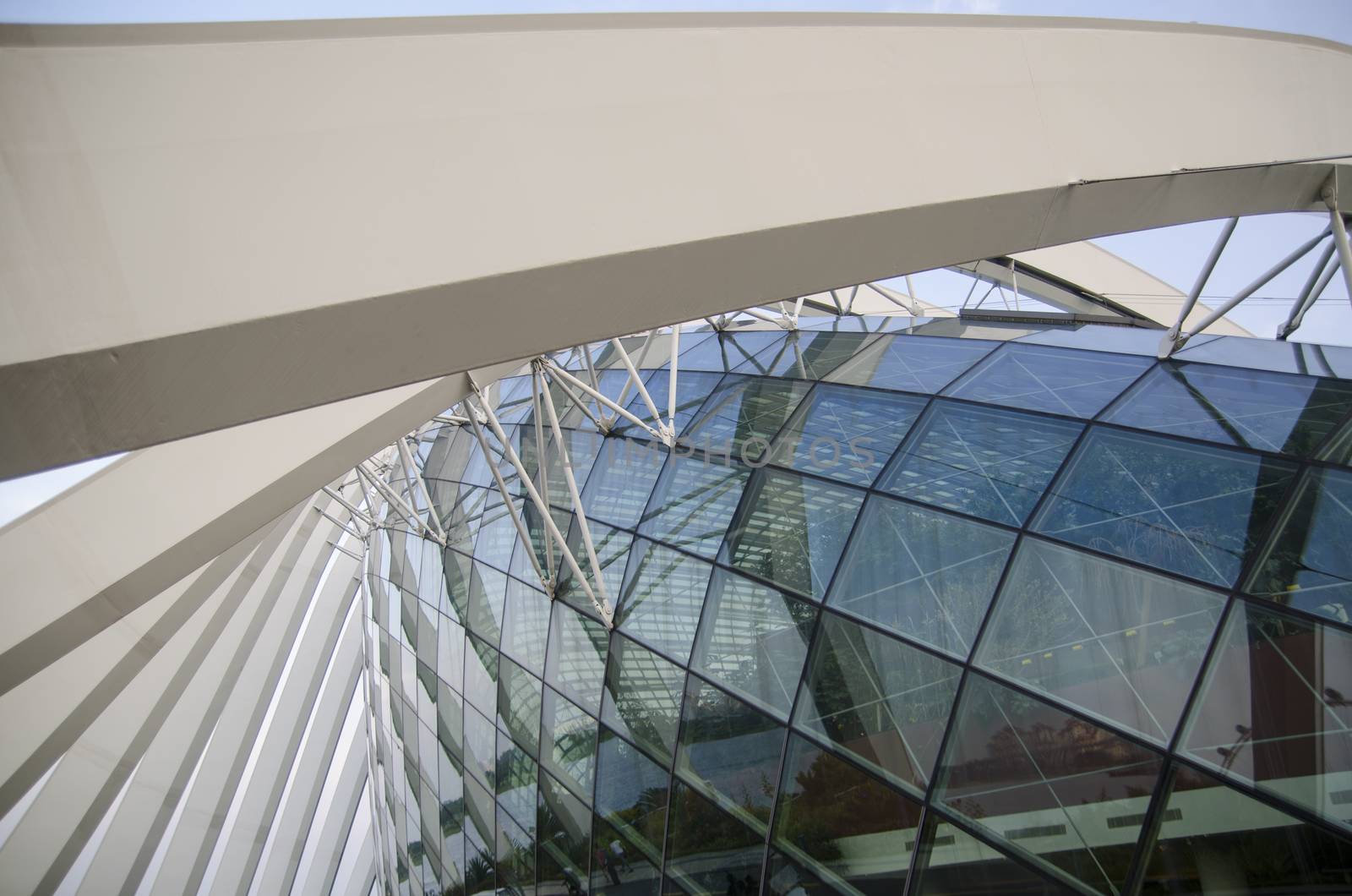 Glass ceiling footbridge with metal structures by Vanzyst