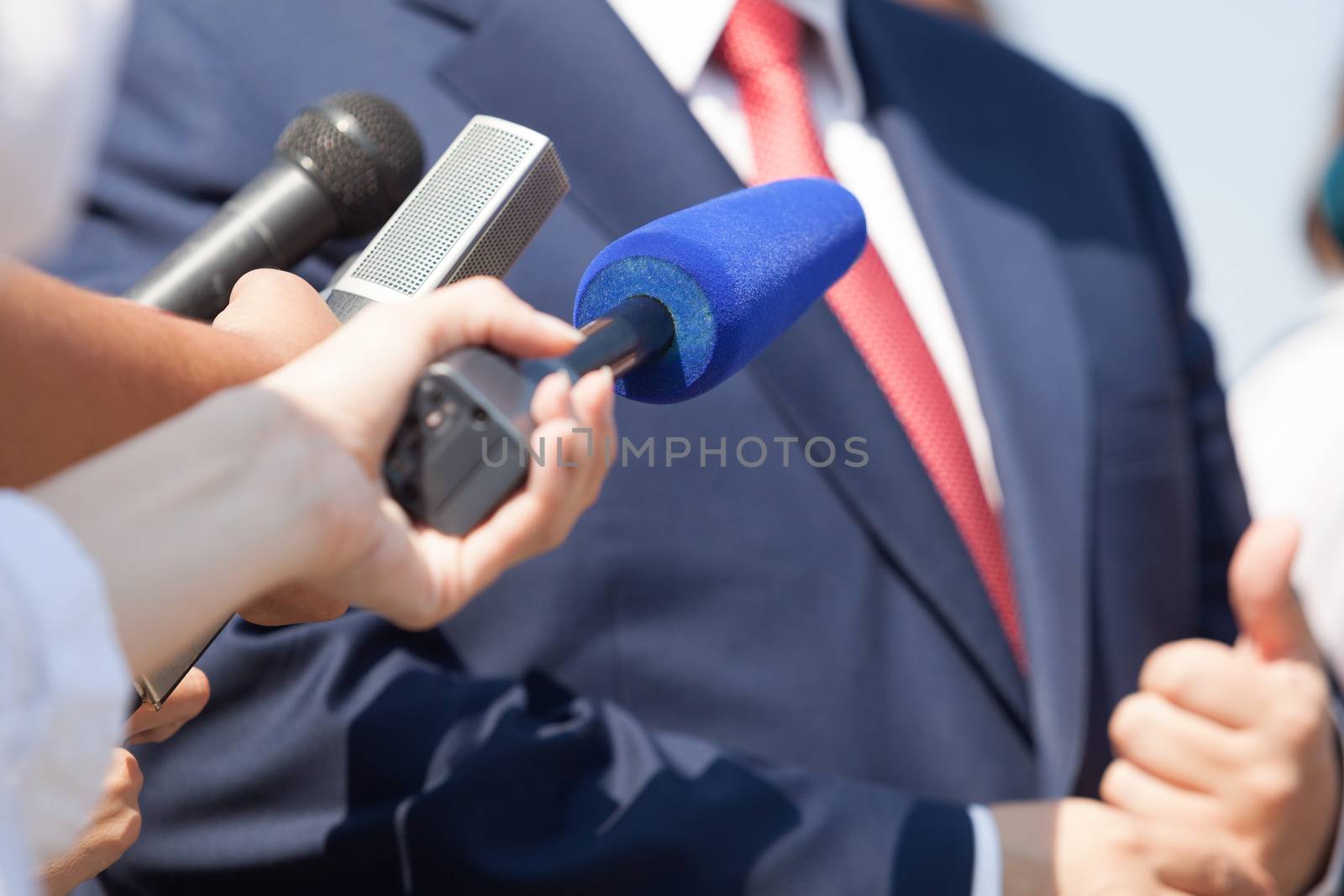 Media interview with business person, politician or spokesman