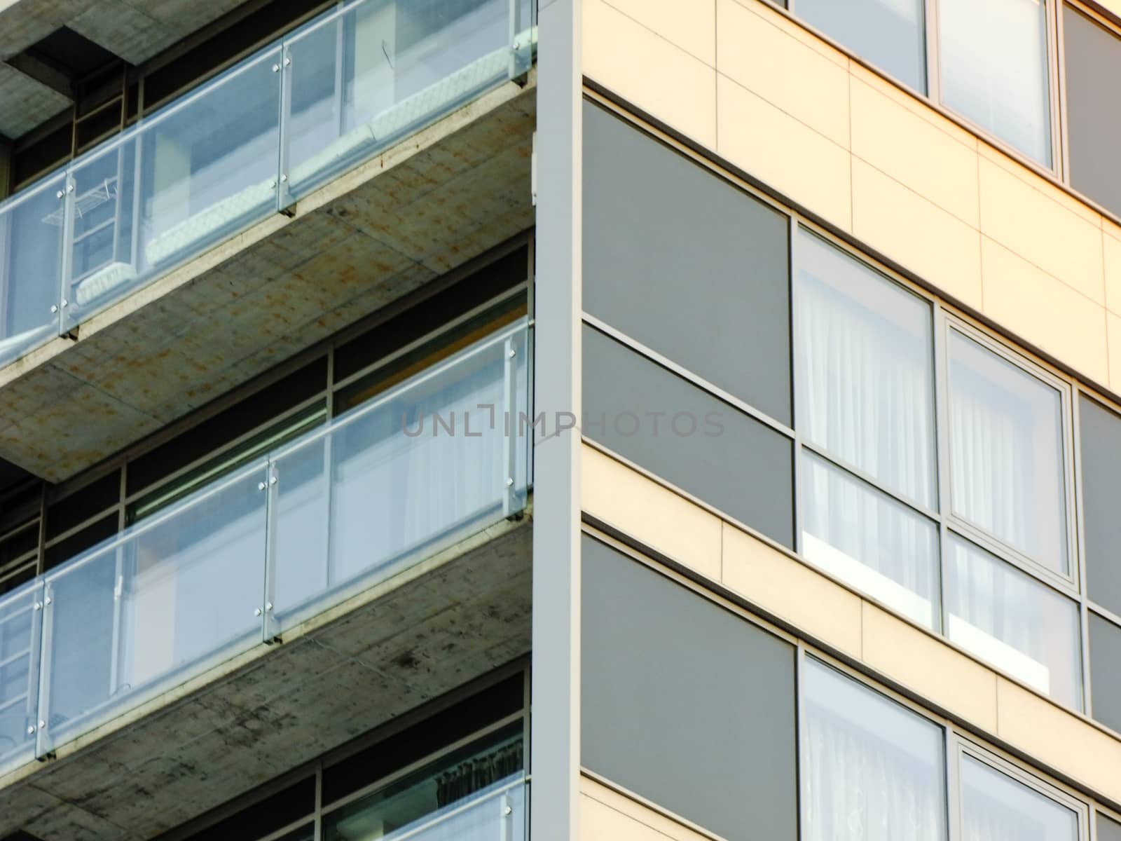 Corner of new modern glass and concrete Building with Balcony in Vilnius City, Lithuania