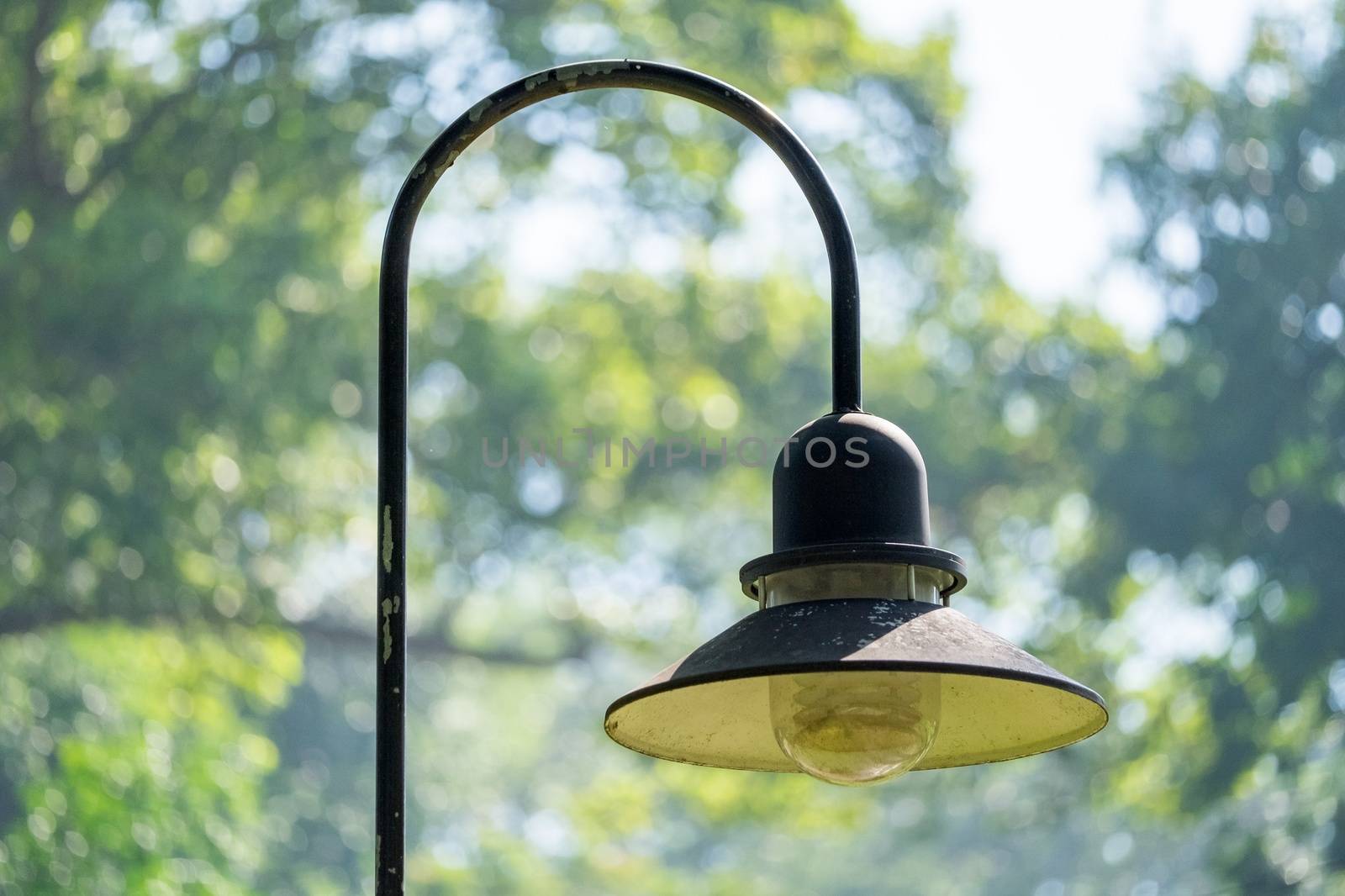 Park lamp in sunshine. Park lamp in sunshine. HOCHIMINH, VIETNAM