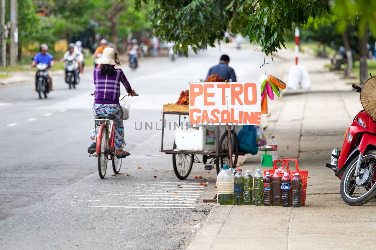 Sale of petrol on the road. HOIAN, VIETNAM May 16, 2015