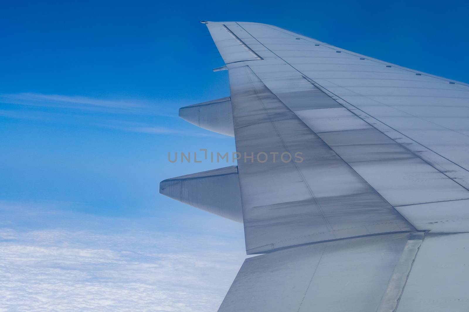 View from airplane window to see sky on day time