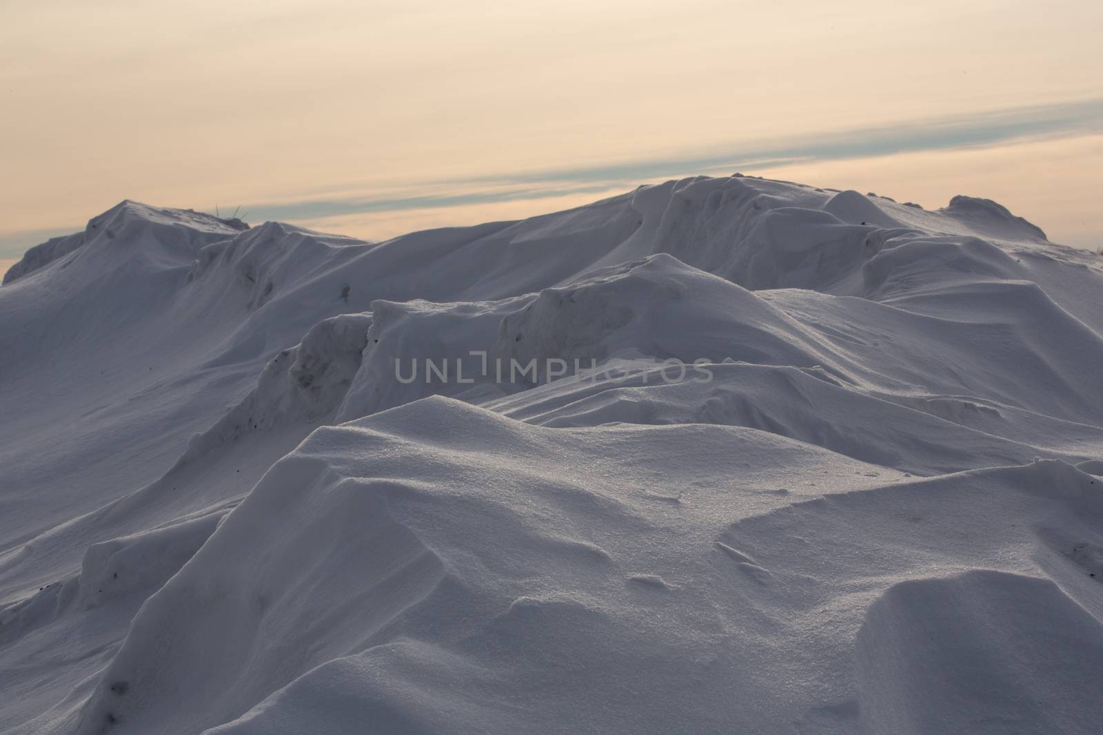 The snow isolated on white background, snow pile