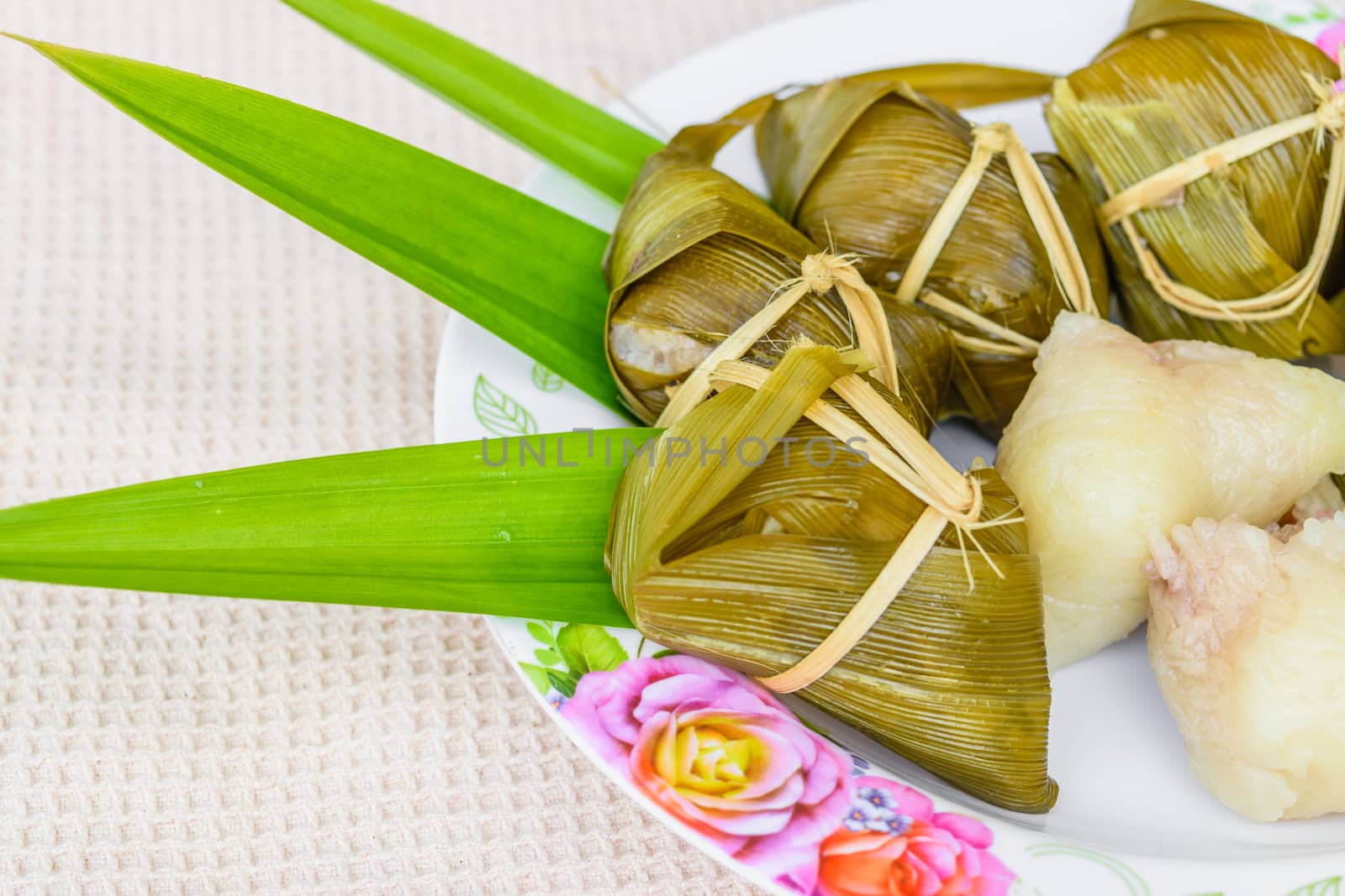 Traditional Thai food style, Thai dessert made from banana and glutinous rice, wrap with pandan (Khao Tom Mat)