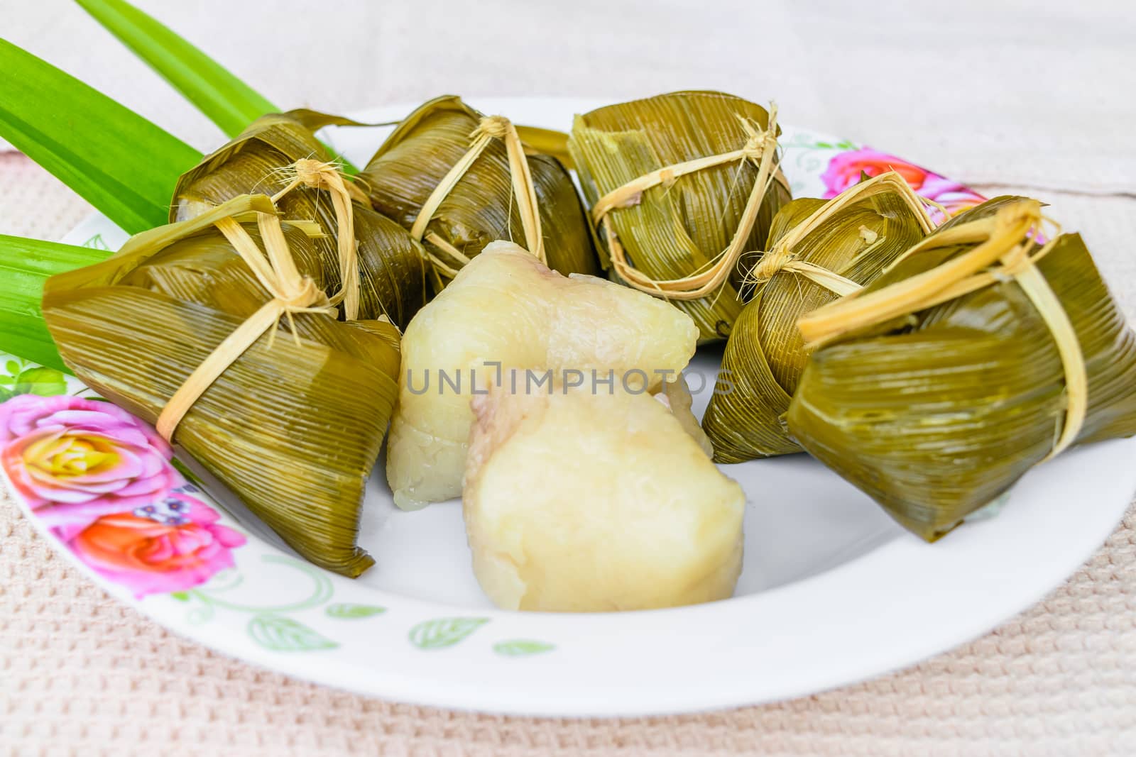 Traditional Thai food style, Thai dessert made from banana and glutinous rice, wrap with pandan (Khao Tom Mat)