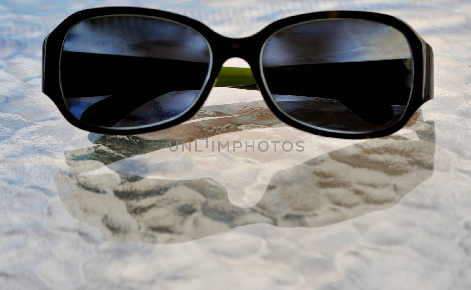 Sunglasses on vacation at the beach.