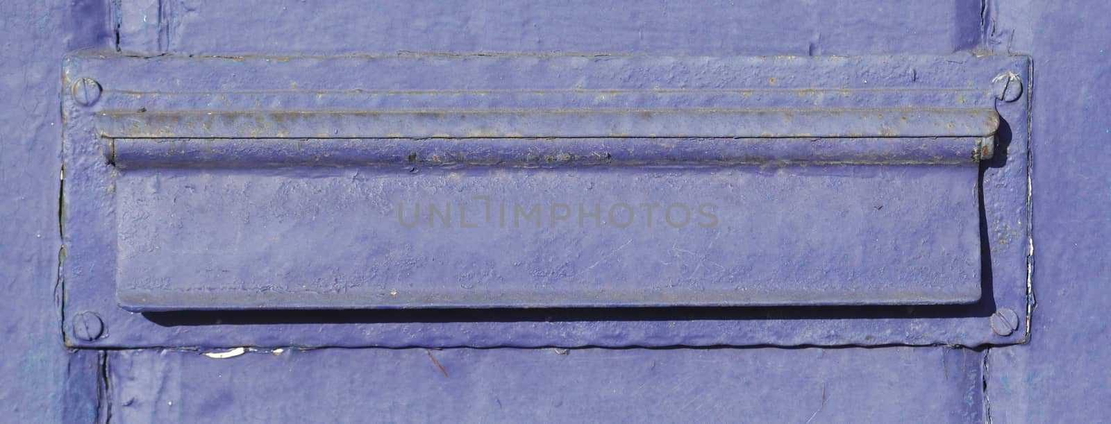 blue-purple letterbox with letter slot
