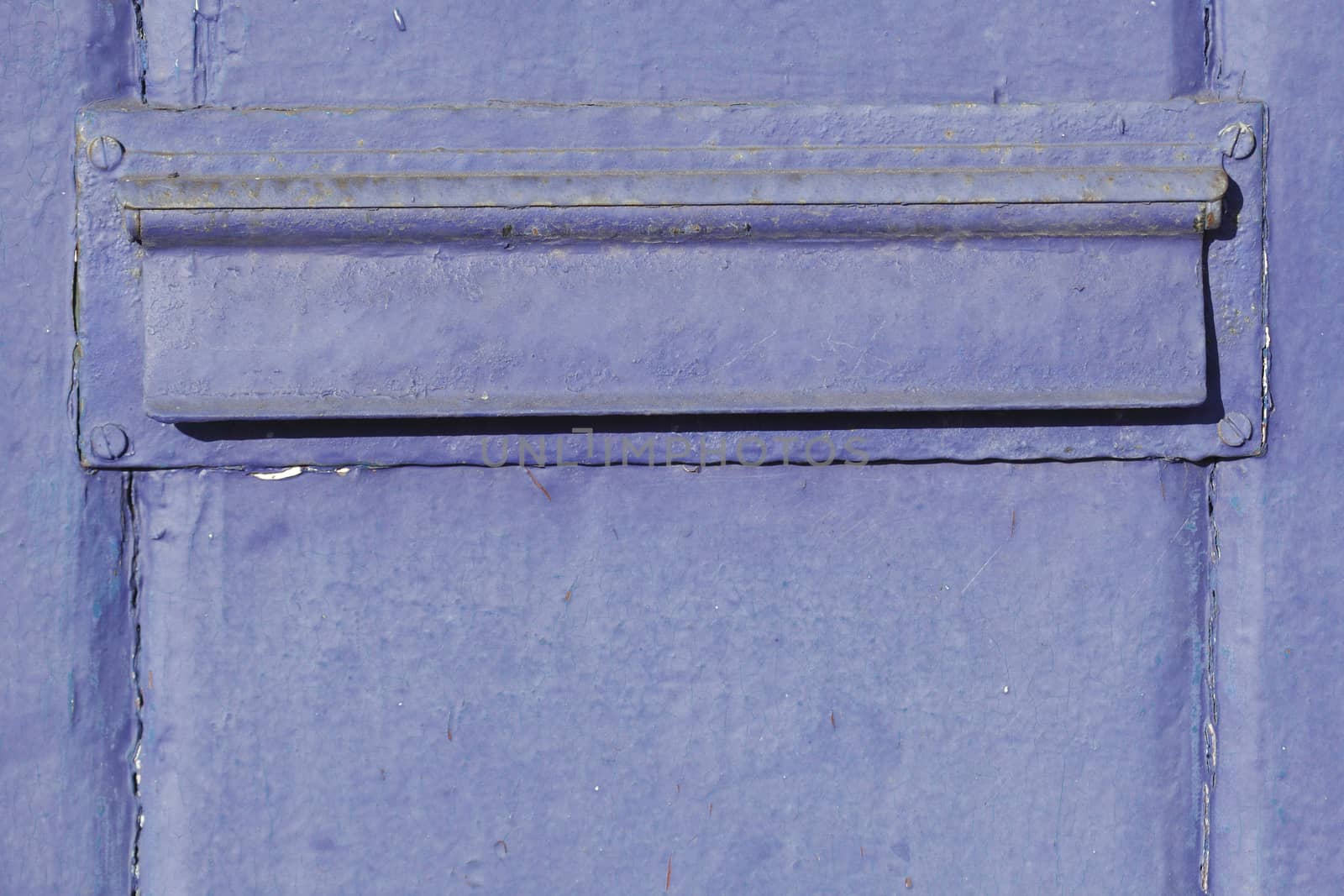blue-purple letterbox with letter slot