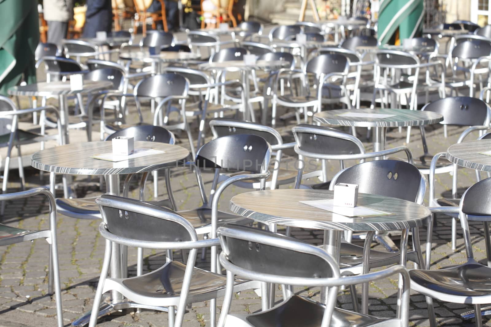 Silver metal chairs and table