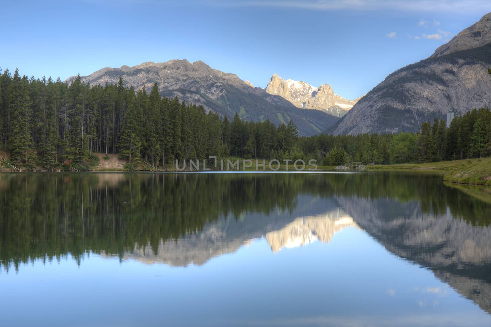 Mountains and Trees Reflecting in a Lake - Banff, Canada by gonepaddling