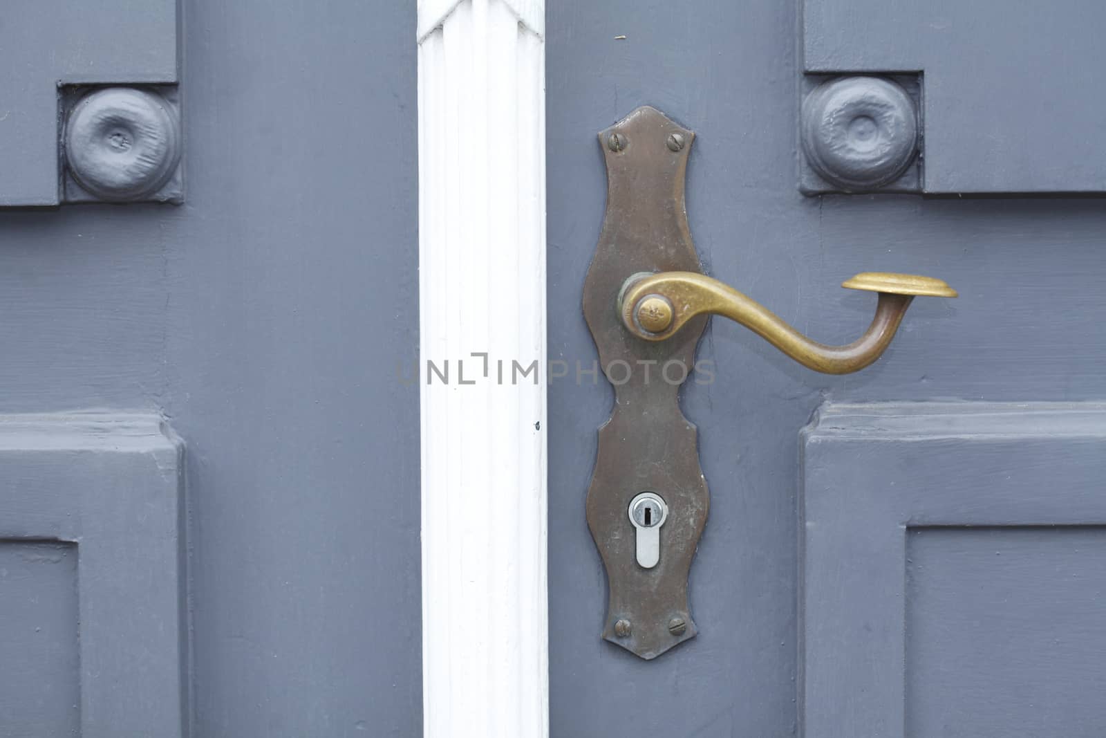 old wooden door with metal lock