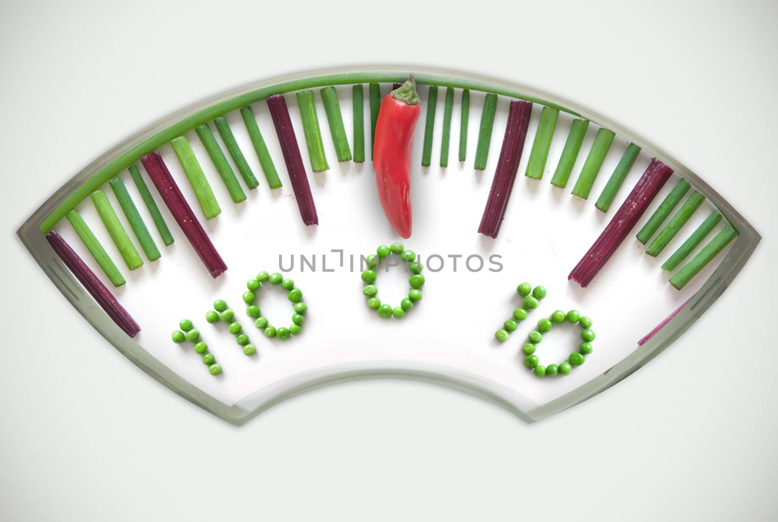 Bathroom weighing scales made of vegetables including chives, betroot and pepper