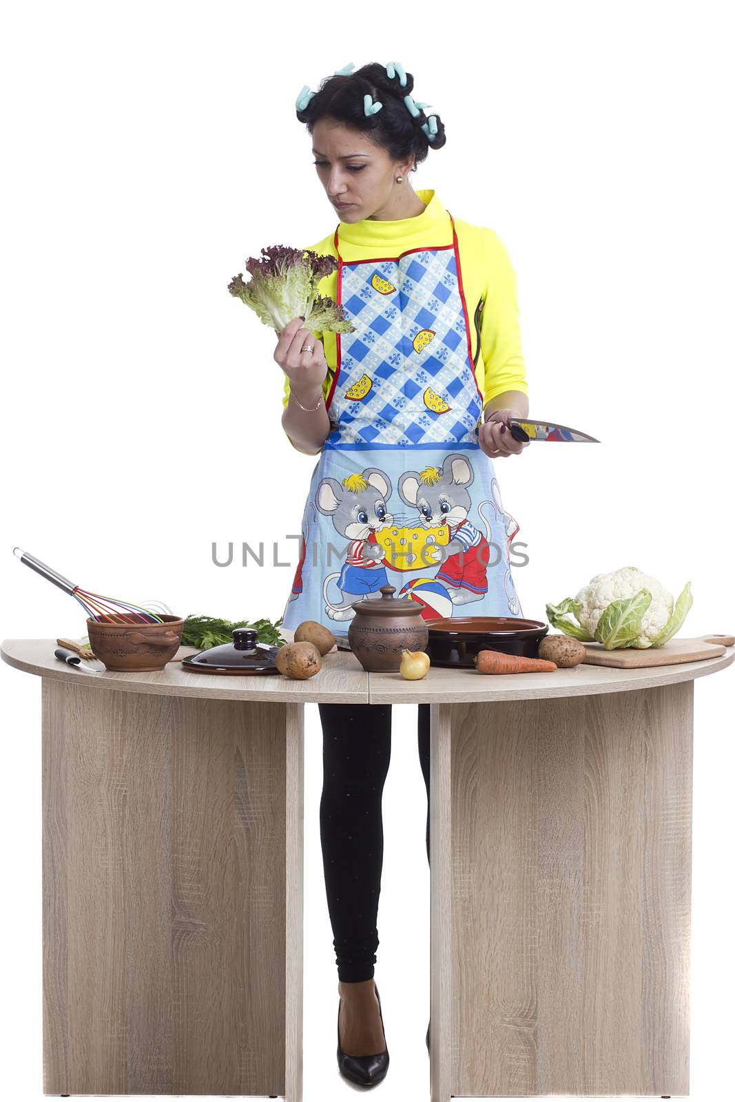 Beautiful woman preparing a meal on a white background