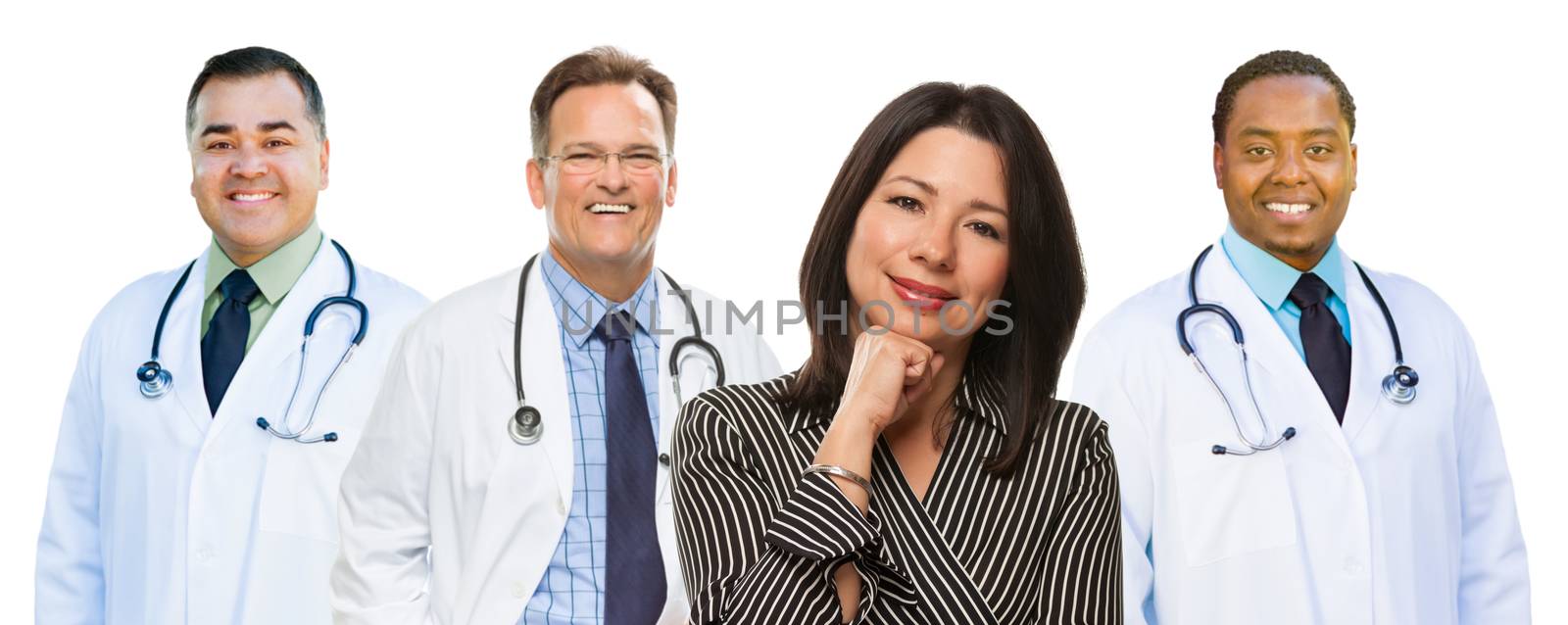 Group of Mixed Race Doctors Behind Hispanic Woman Isolated on a White Background.