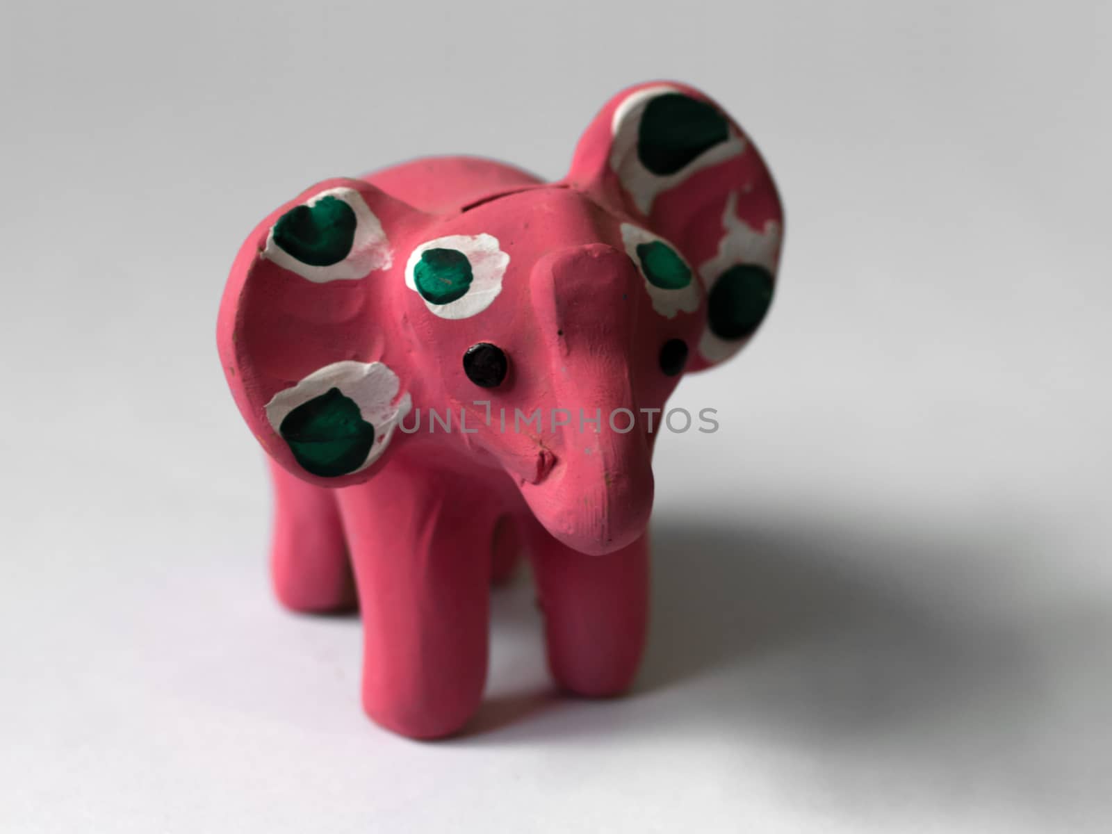 COLOR PHOTO OF PINK ELEPHANT TOY