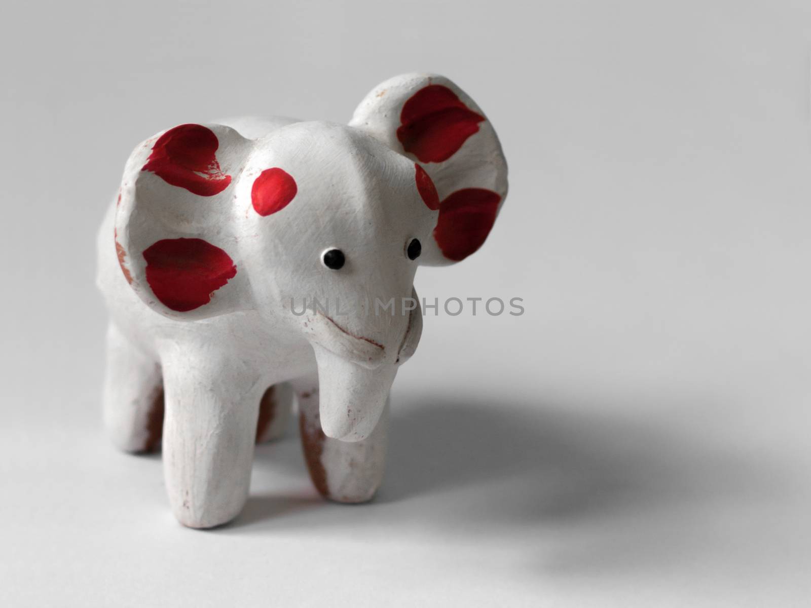COLOR PHOTO OF WHITE ELEPHANT TOY