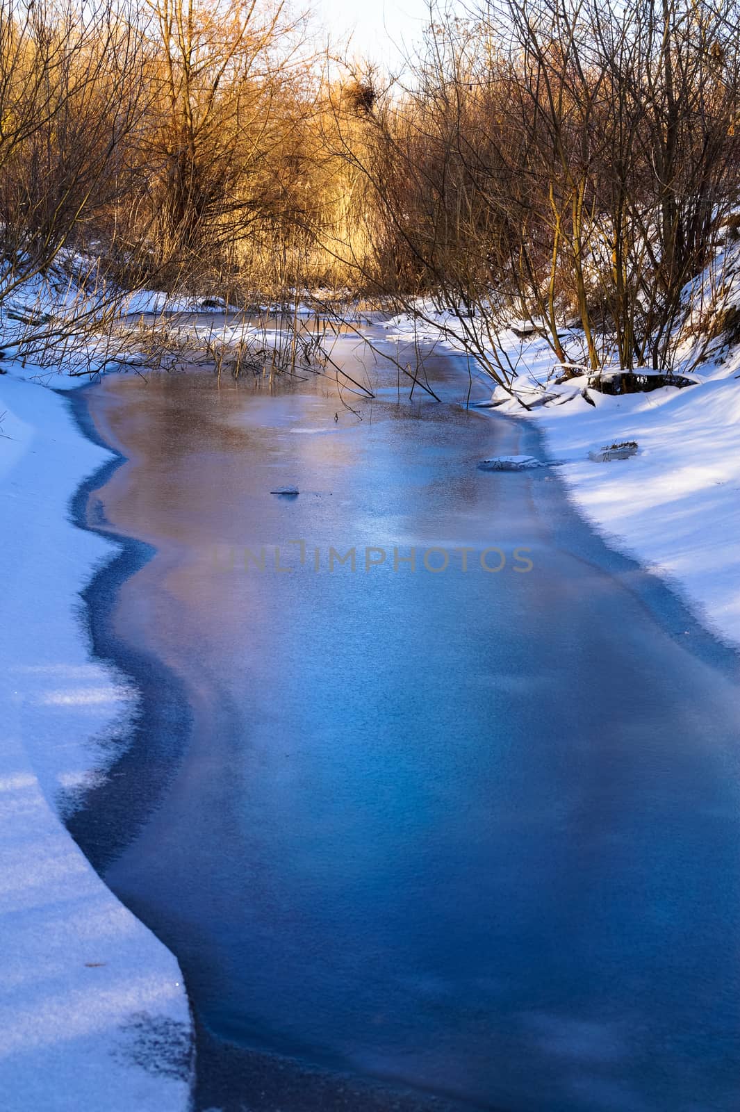 nature winter river covered with ice by Oleczka11