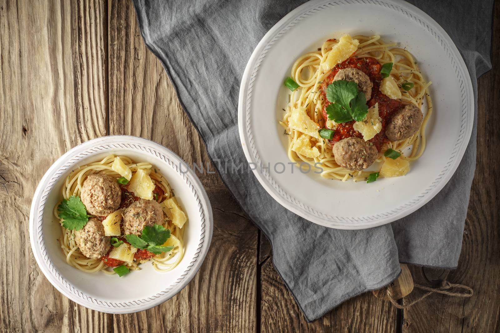 Ready-made spaghetti with meatballs at the old table by Deniskarpenkov