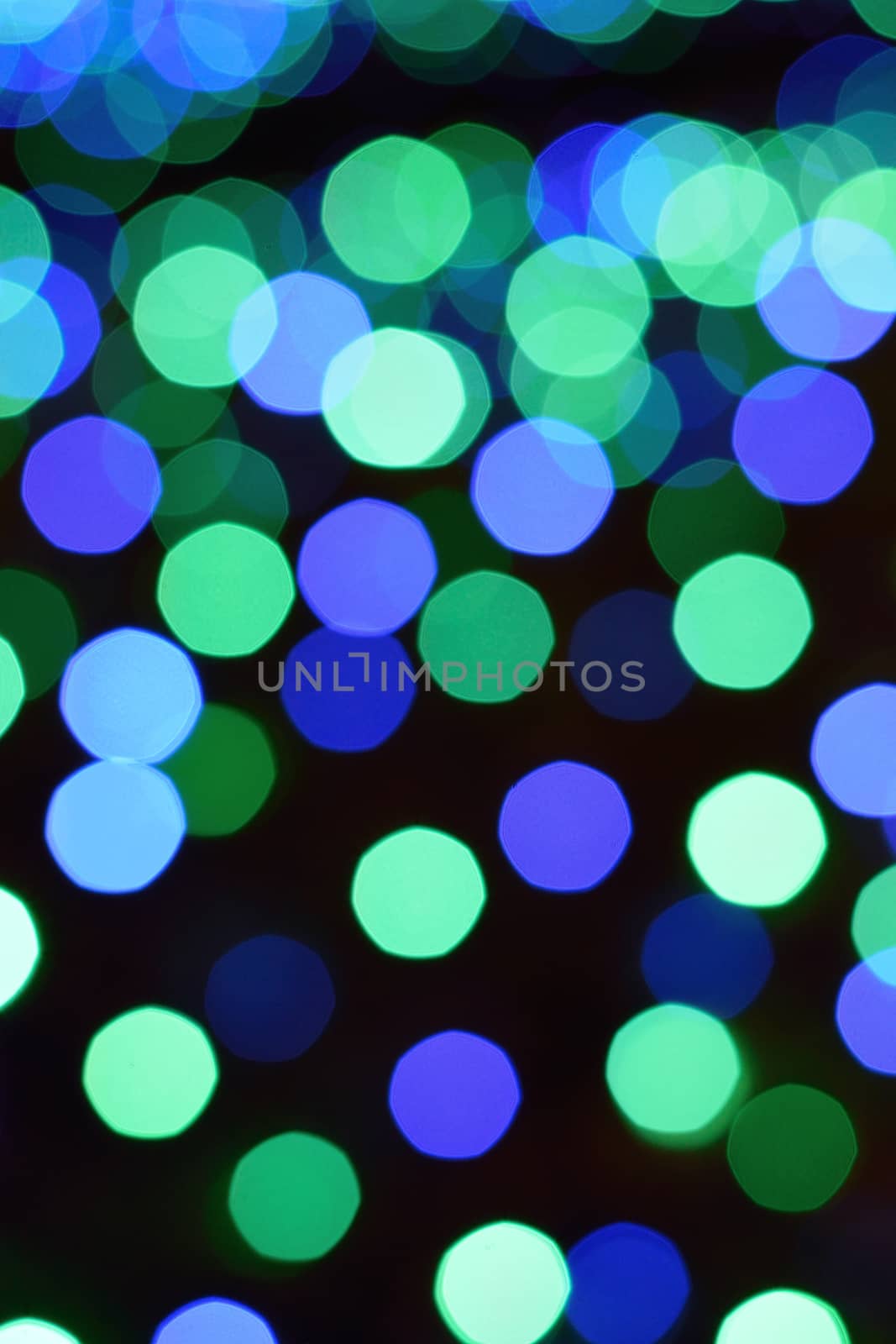 Background Winter illumination blue LED blurred lights in vertical frame