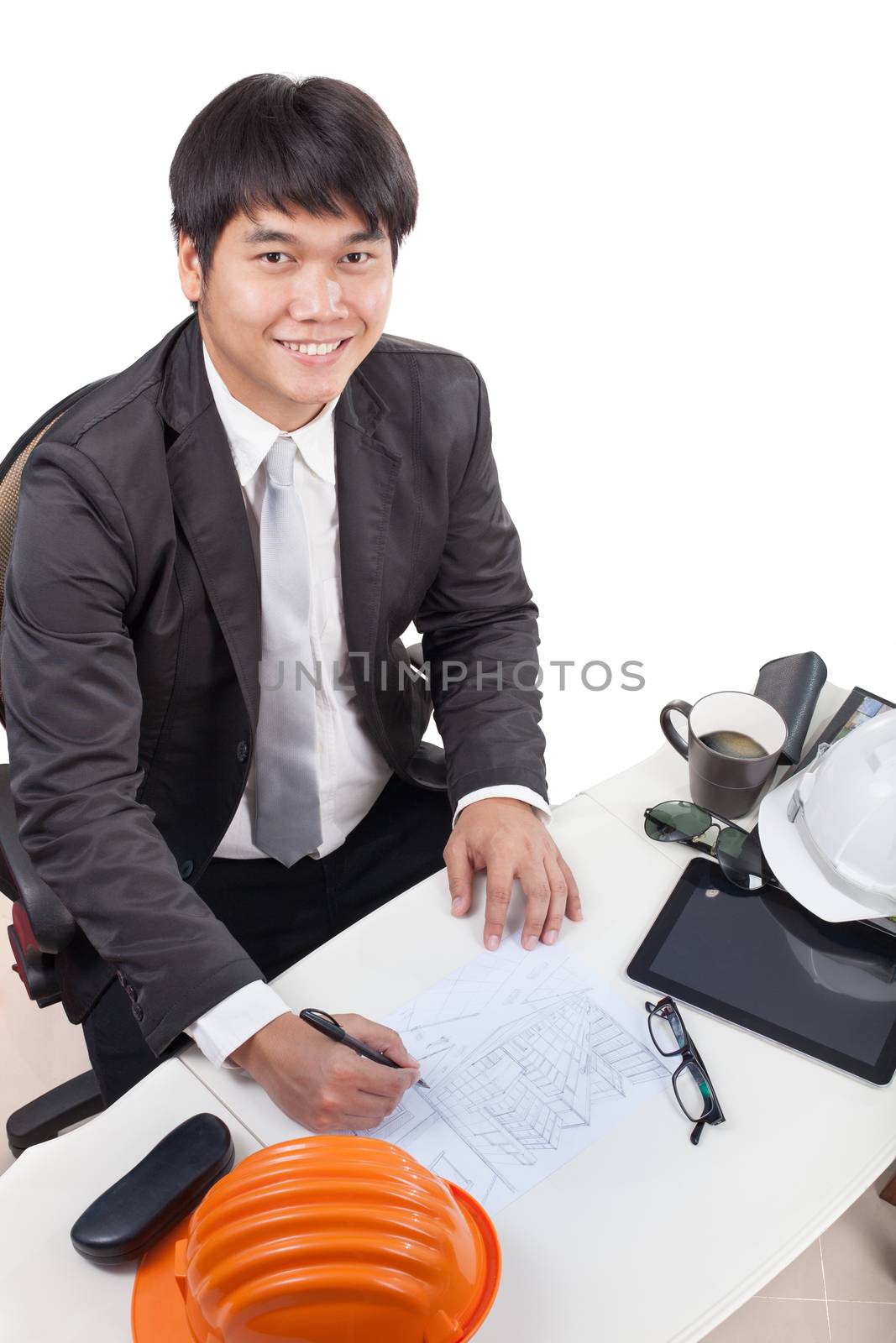 portrait of young architect working drawing perspective building on working table and smiling to camera use for people occupation and construction industry business theme