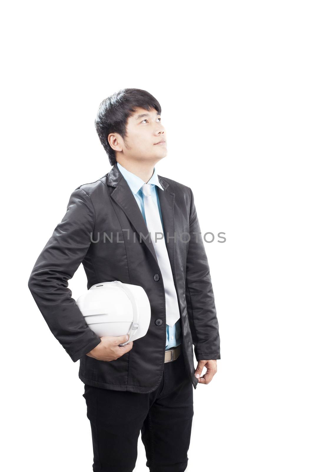 young asian engineering man standing and holding safety helmet isolated white background