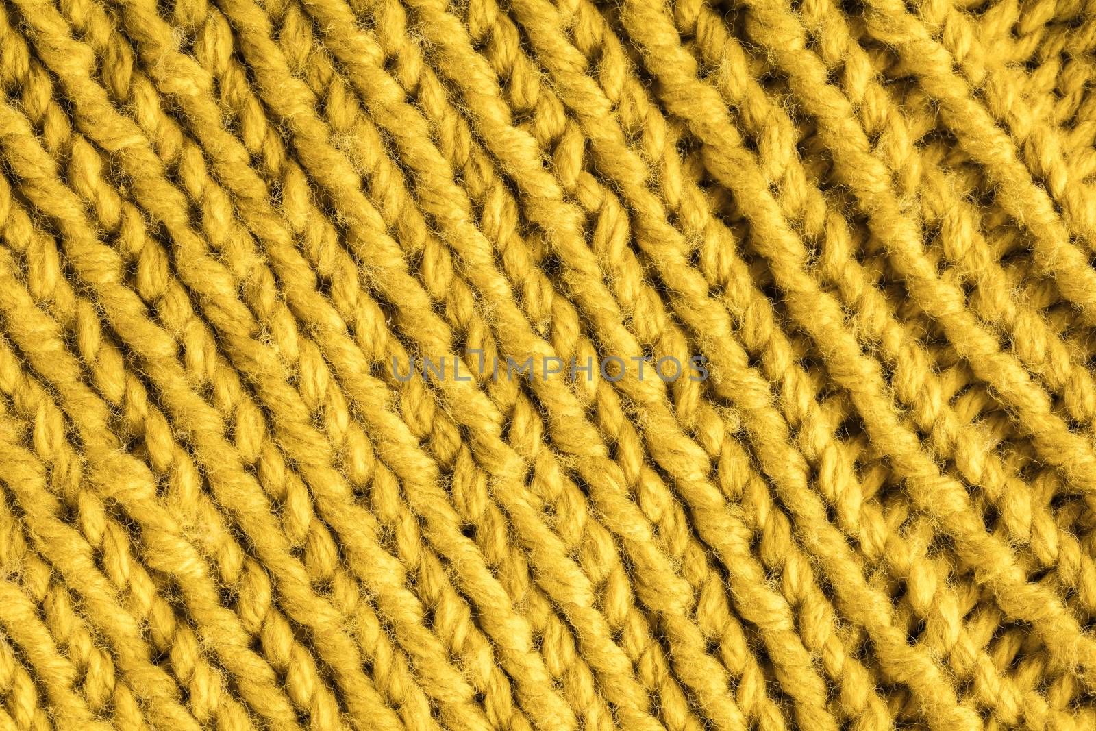 the abstract background texture of a knitted fabric