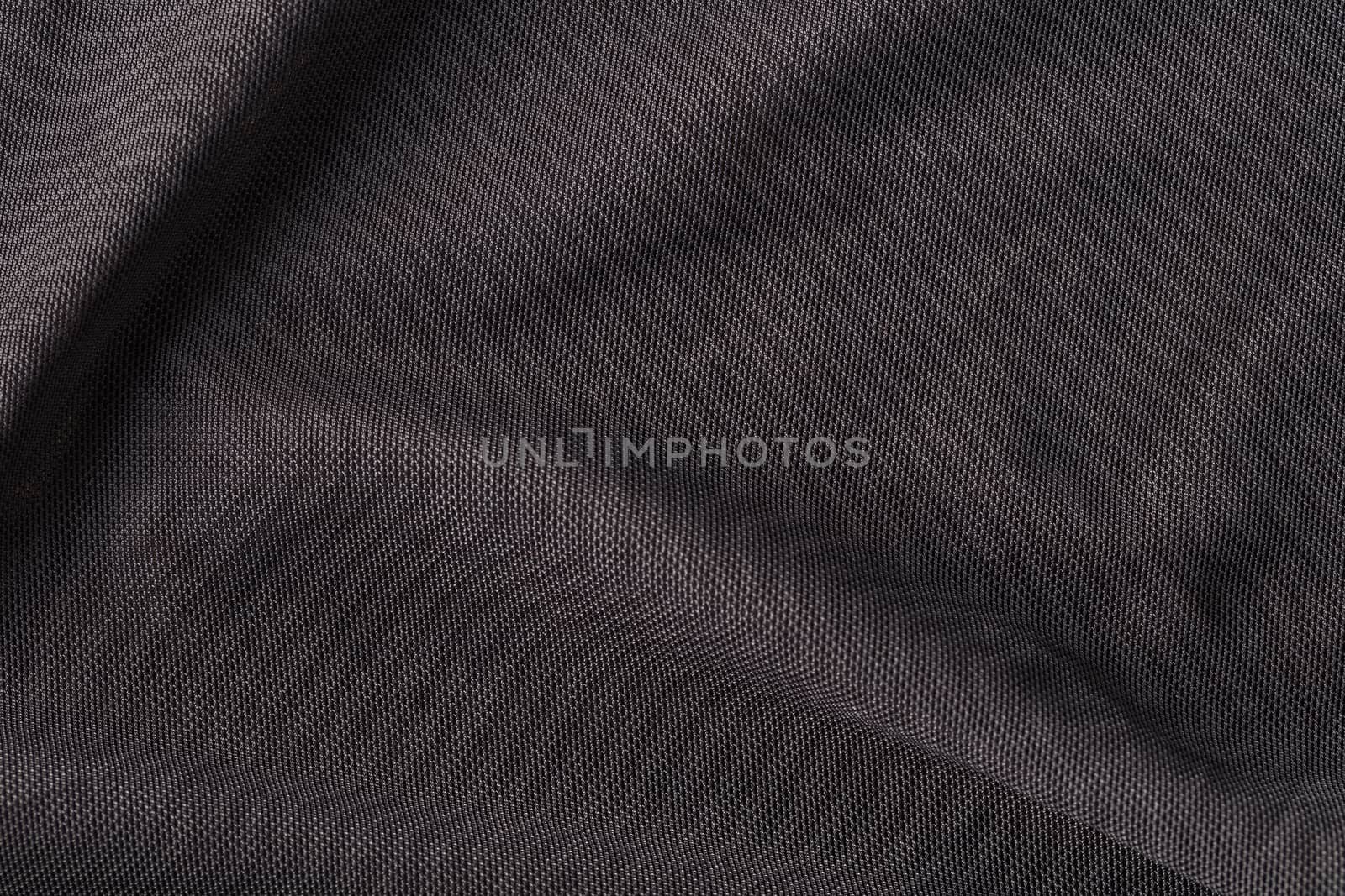 the abstract background texture of synthetic fabric