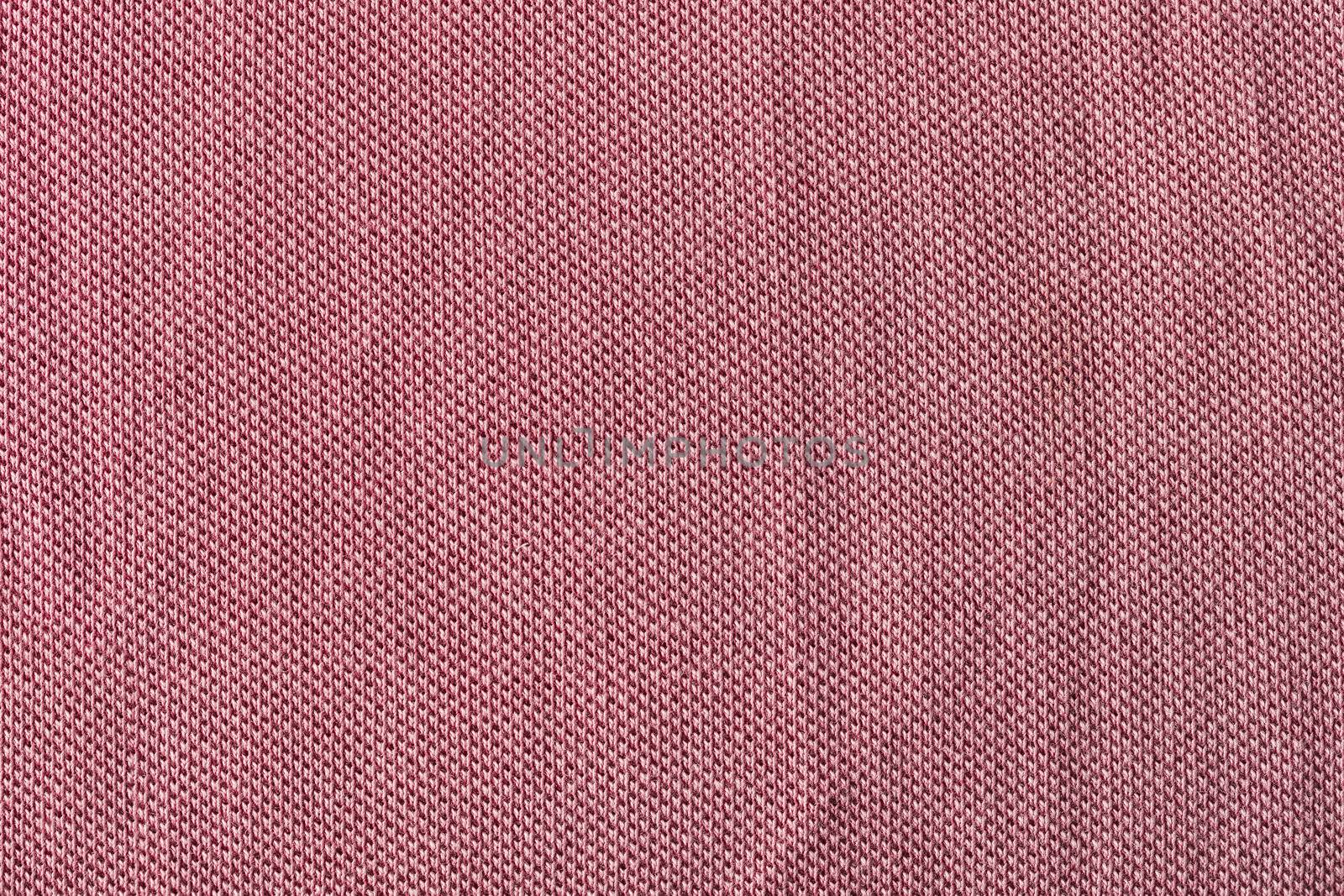 the abstract background texture of a knitted fabric