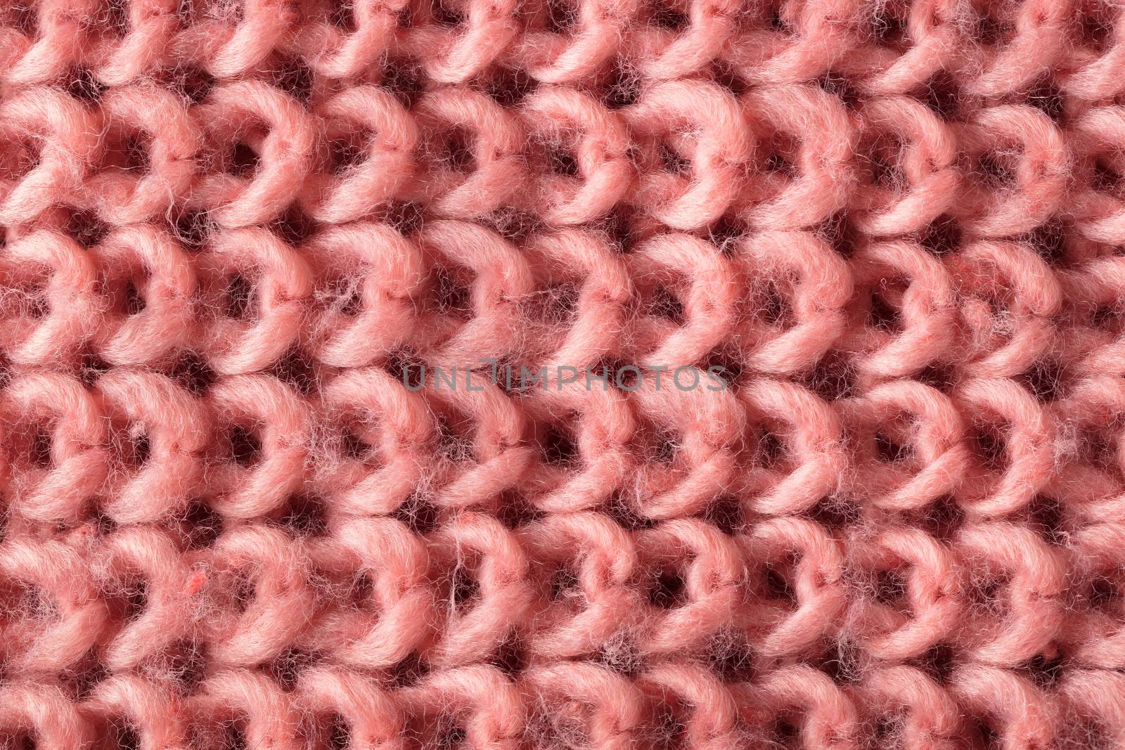 the abstract background texture of a knitted fabric