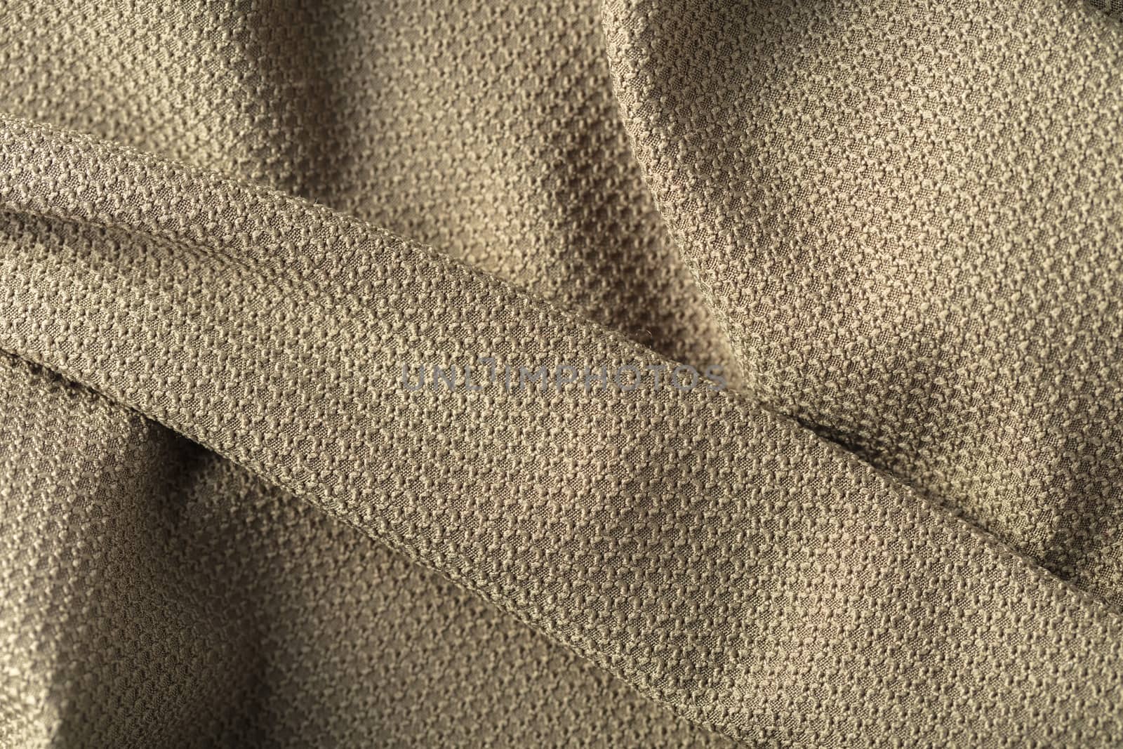 the abstract background texture of synthetic fabric