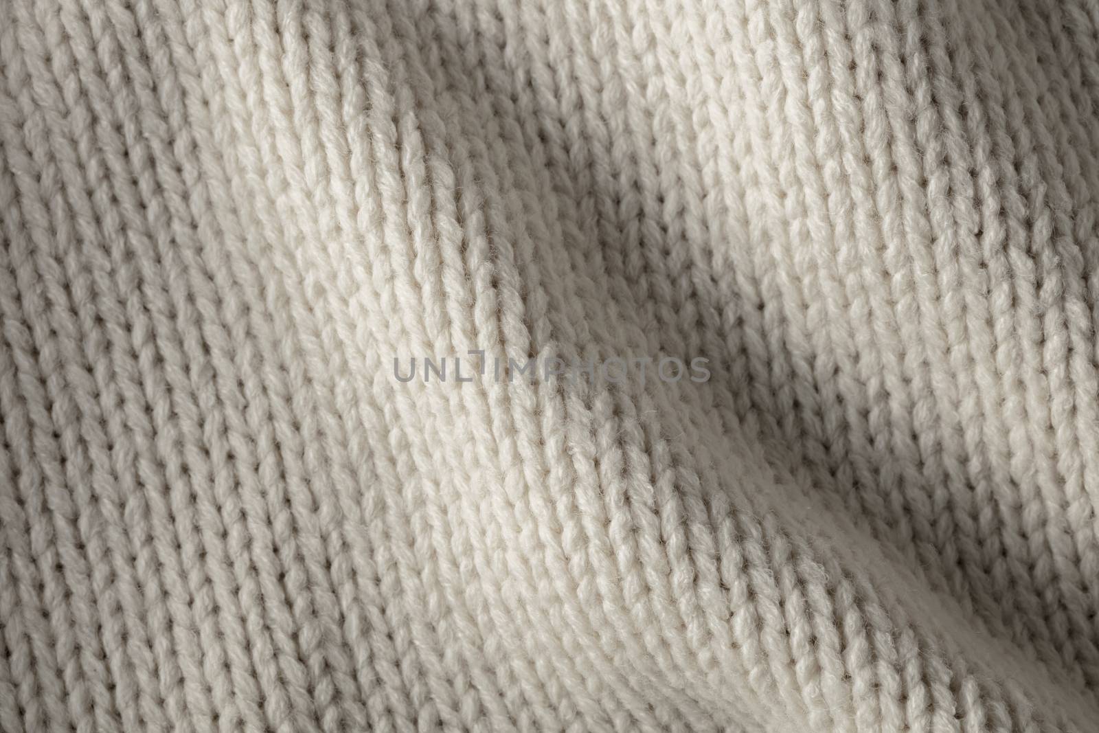 the abstract background texture of a knitted fabric