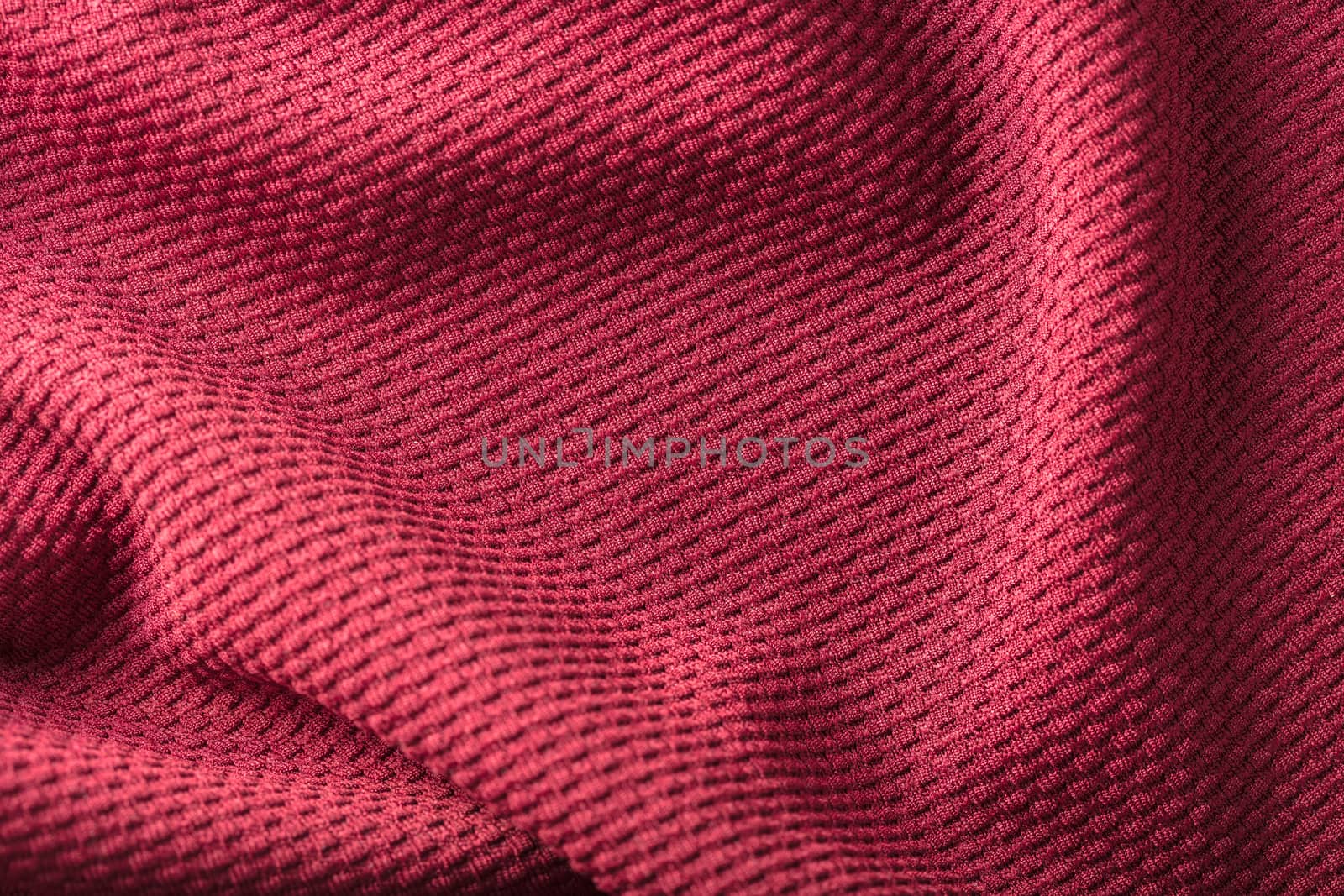 the abstract background texture of synthetic fabric
