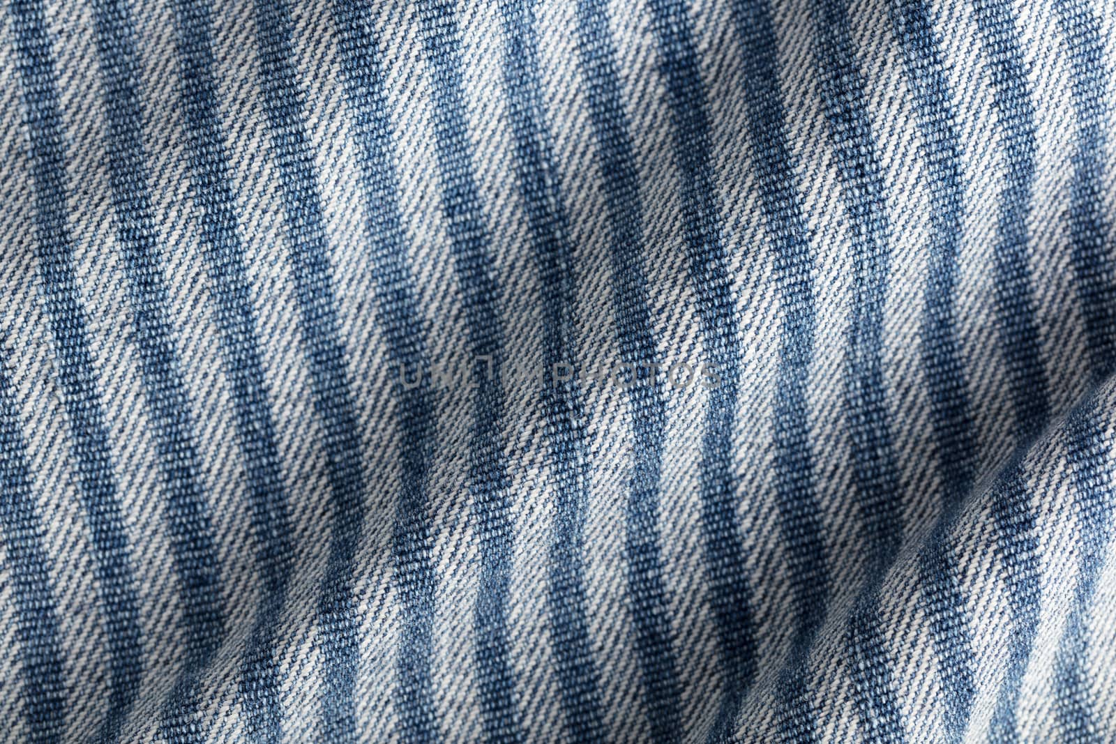 abstract background texture of denim fabric striped