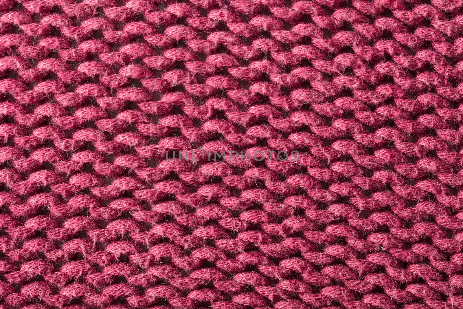 the abstract background texture of a knitted fabric
