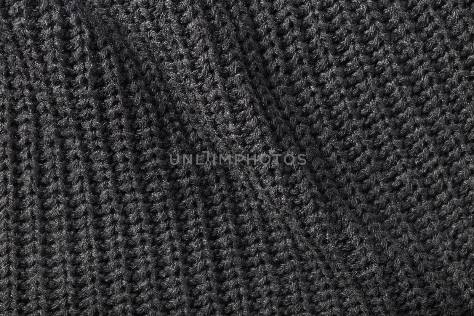 the abstract background texture of a knitted fabric
