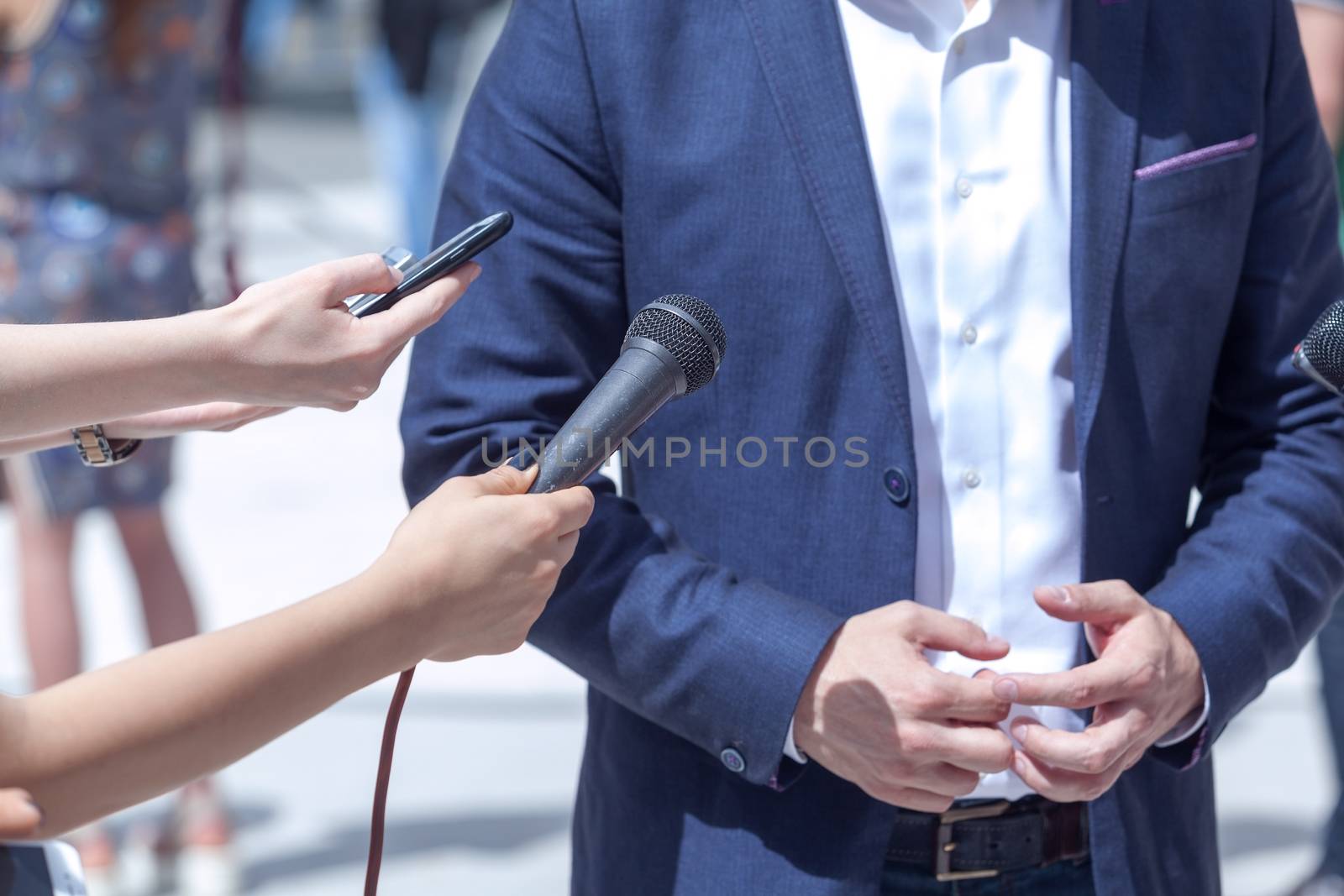 Media interview with businessman, spokesman or politician