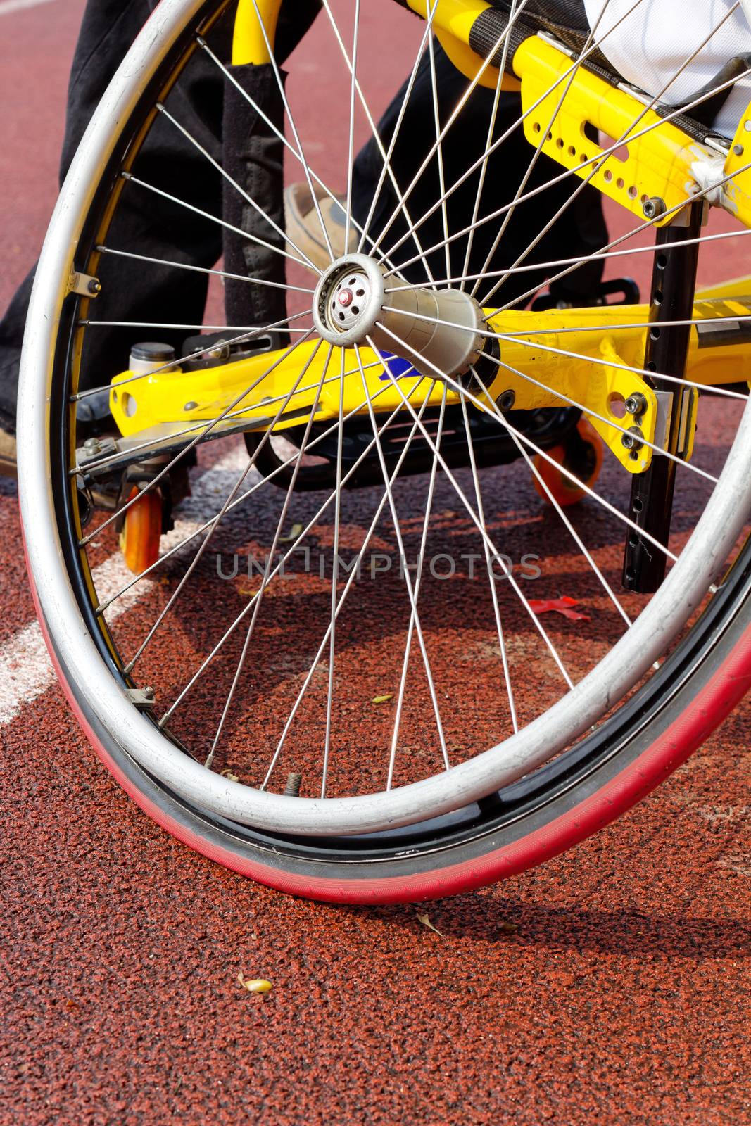 Detail image of wheelchair race on track,wheelchair race